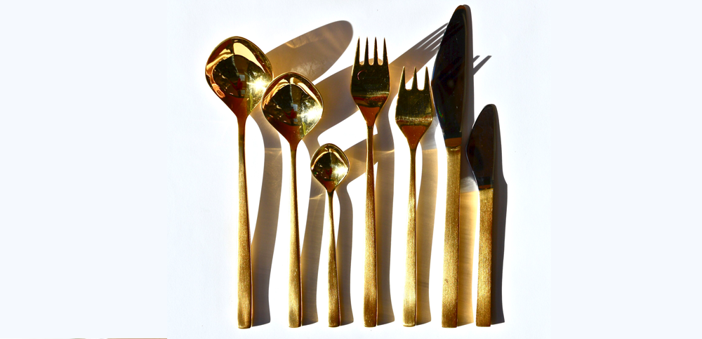 1958 rare danish modern gold plated flatware set, 33 pieces. designed by tias eckhof for lundtofte, denmark.