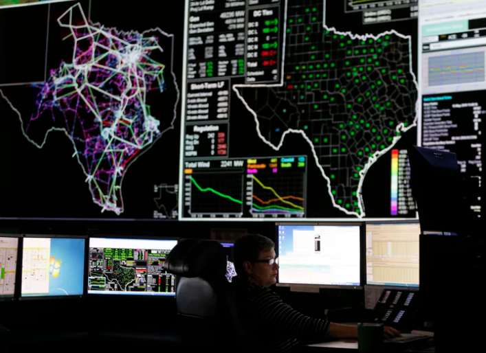 System operators work in the command center of the Electric Reliability Council of Texas in Taylor, Texas on Tuesday, May 15, 2018. About 90 percent of Texas' electric load is managed by ERCOT. (Vernon Bryant/Staff Photographer)