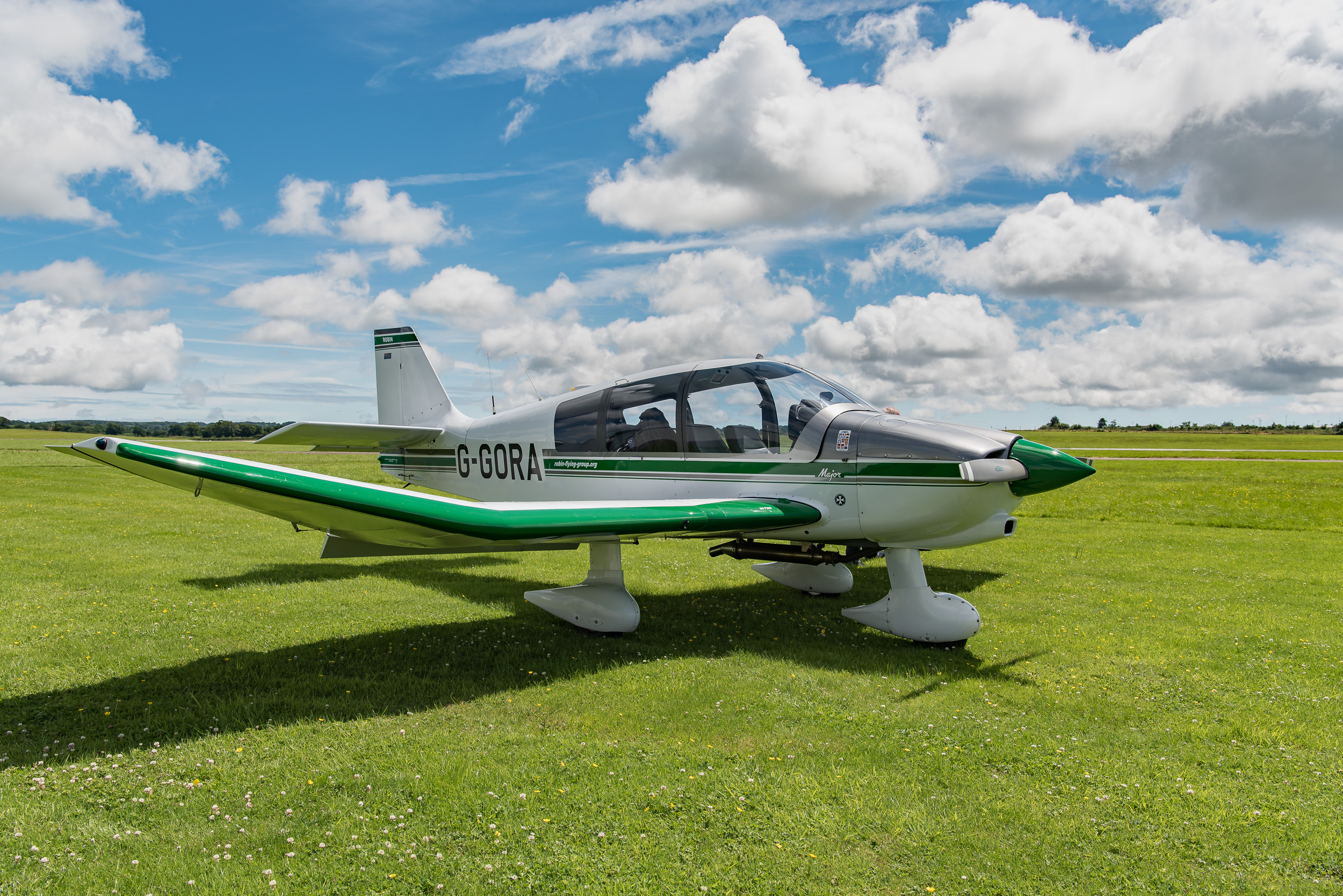 The Robin DR400, a wonderful aircraft to fly, but the low wings make photography challenging.