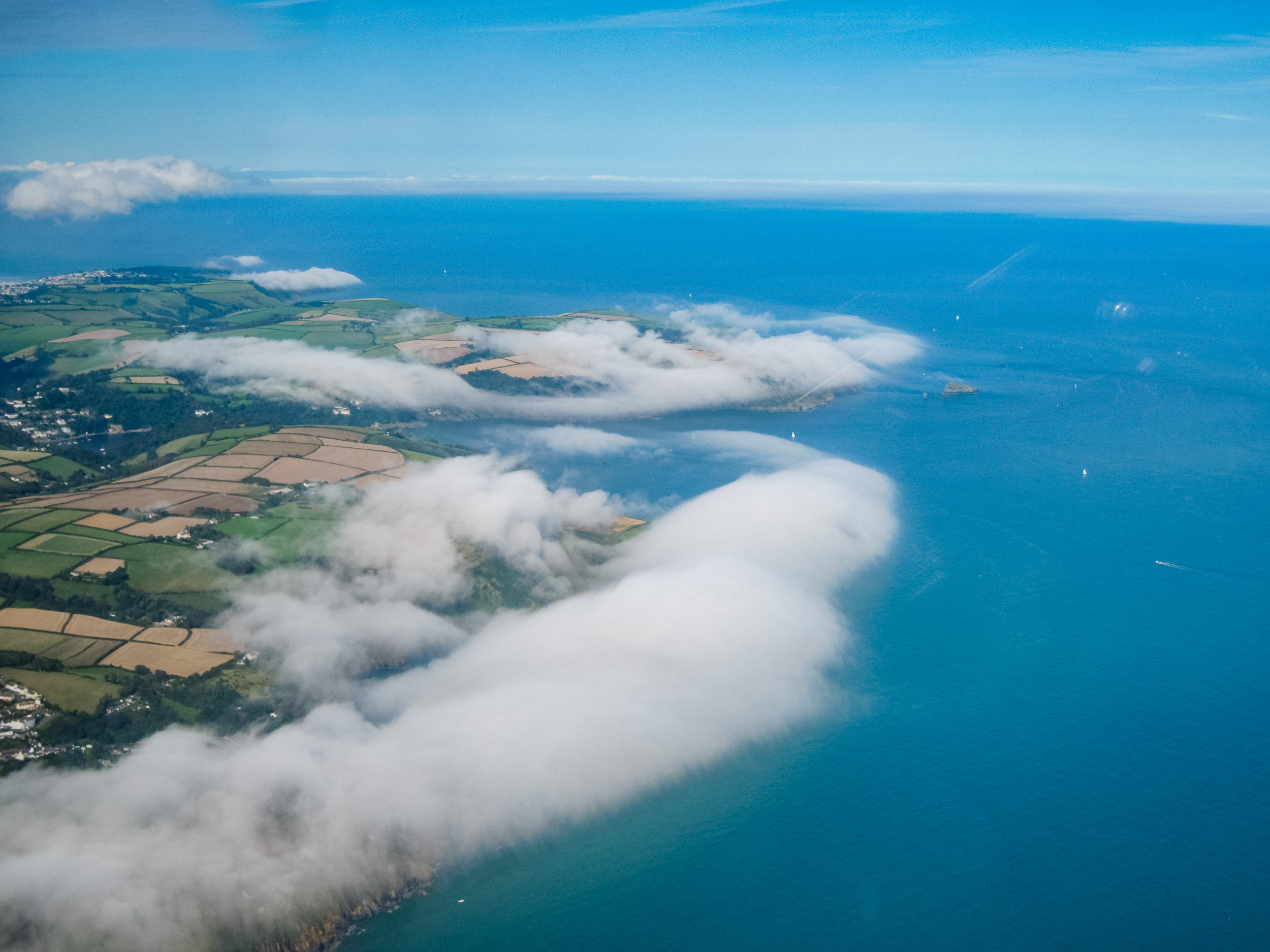 Amazing cloud formations but the image suffers from canopy reflections on the right.