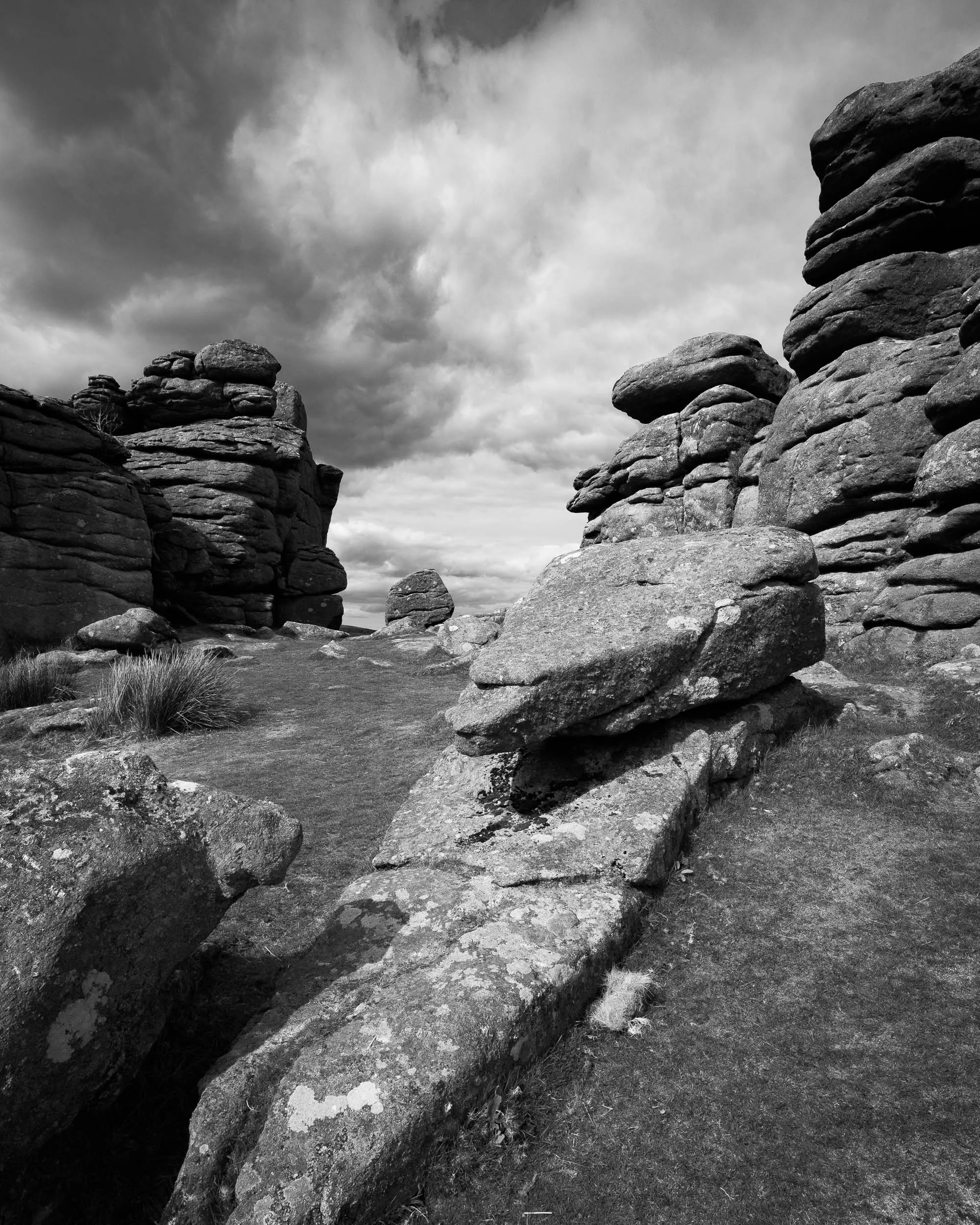 Houndtor on Dartmoor National Park in black and white