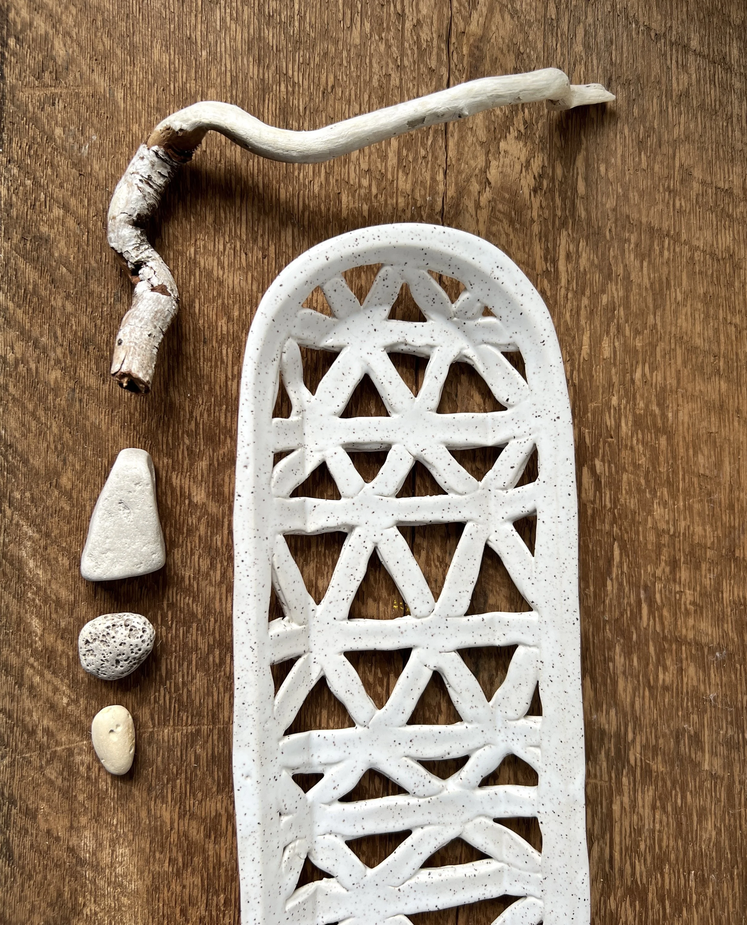 white oval cavebasket