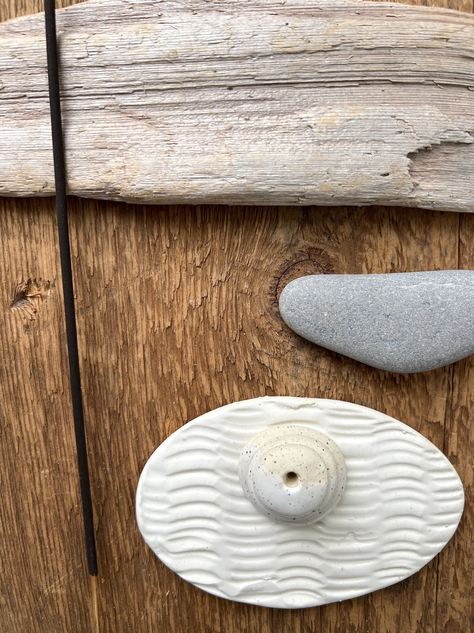 white texture slab + incense cairn