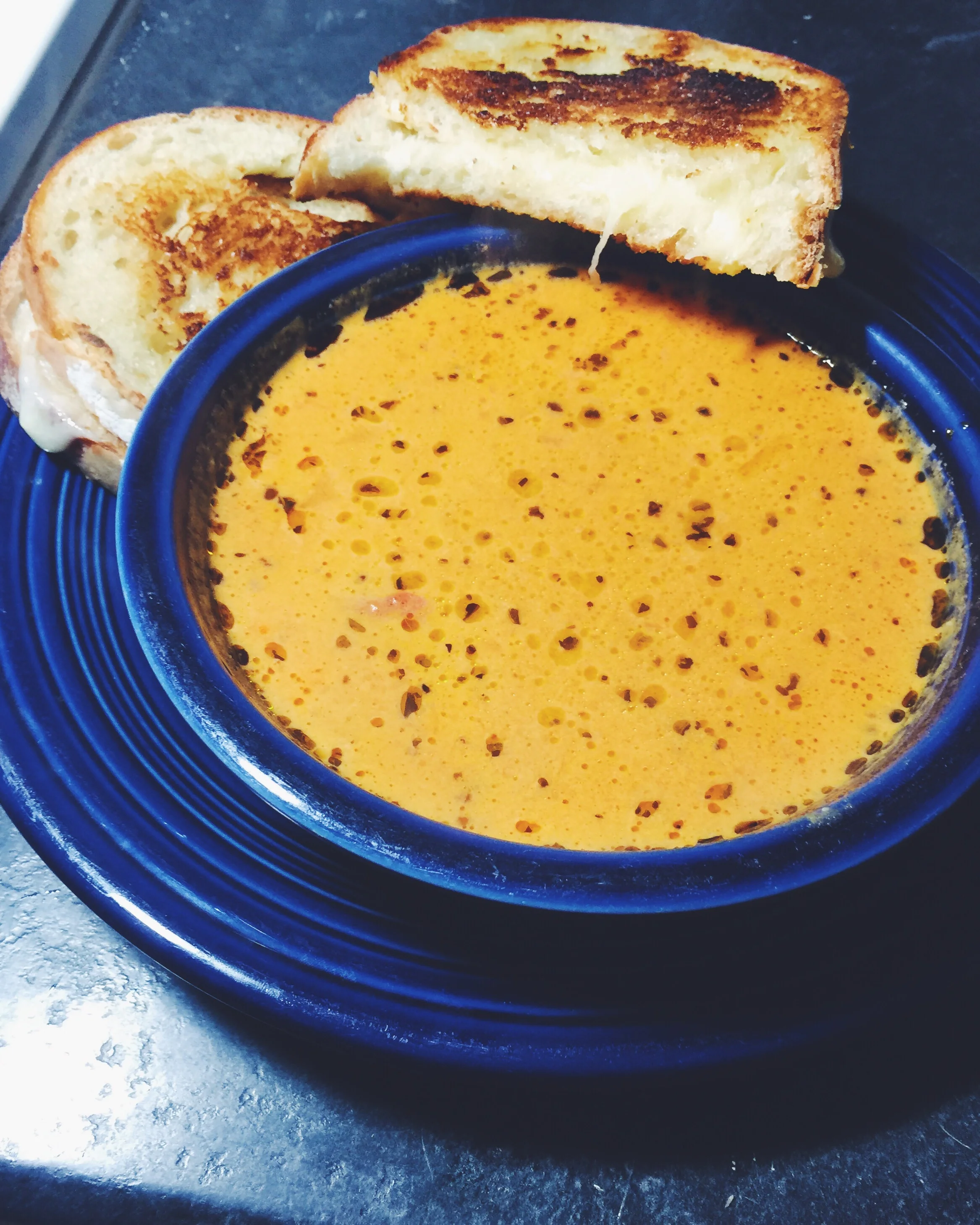 tomato basil bisque + gruyere grilled cheese