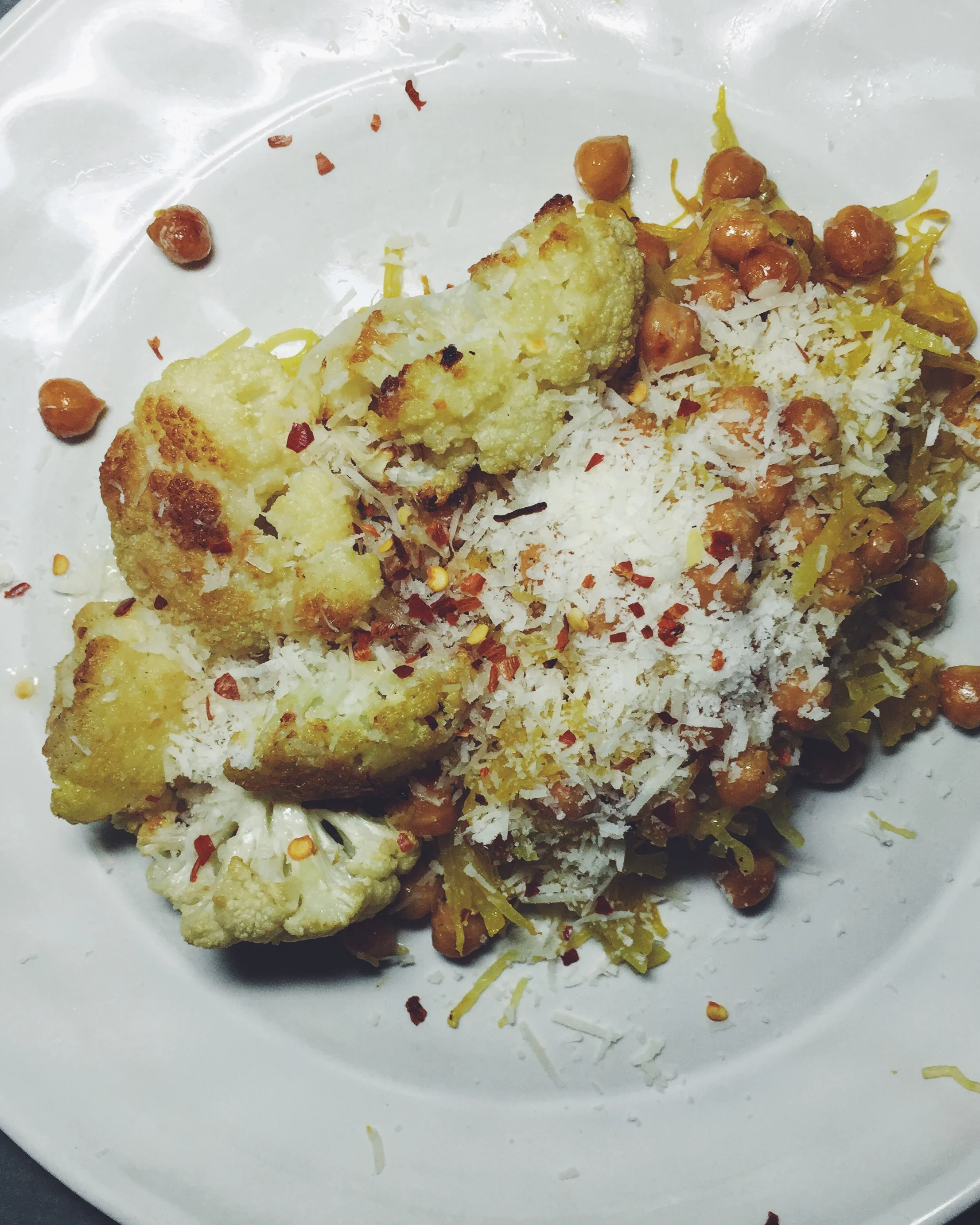 garlicky spaghetti squash with chickpeas, cauliflower, & parmigiano-reggiano