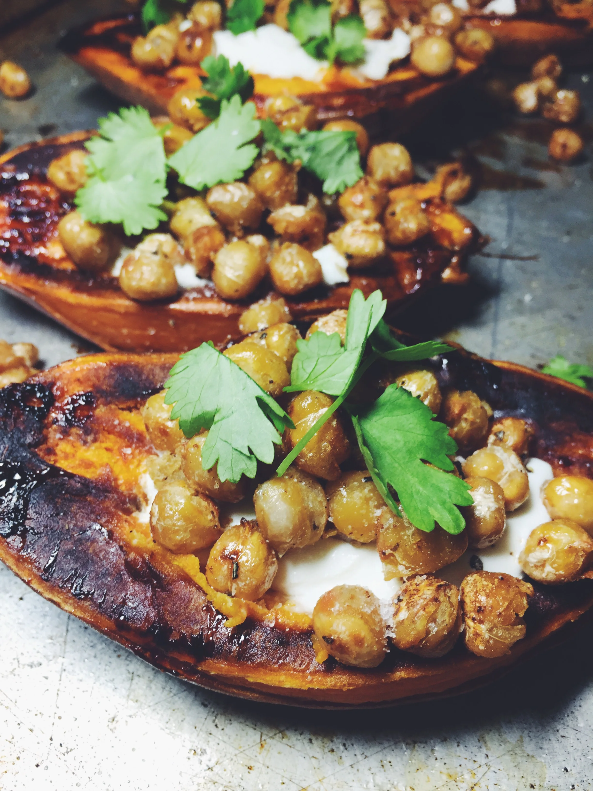 roasted sweet potato with goat cheese, crispy chickpeas, and cilantro