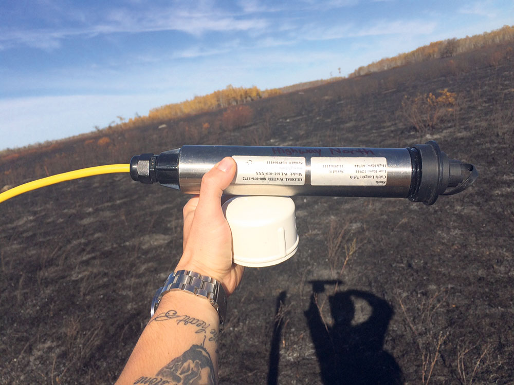 Data logger used to measure the height of groundwater following a prescribed burn on the tall grass prairie. NCC