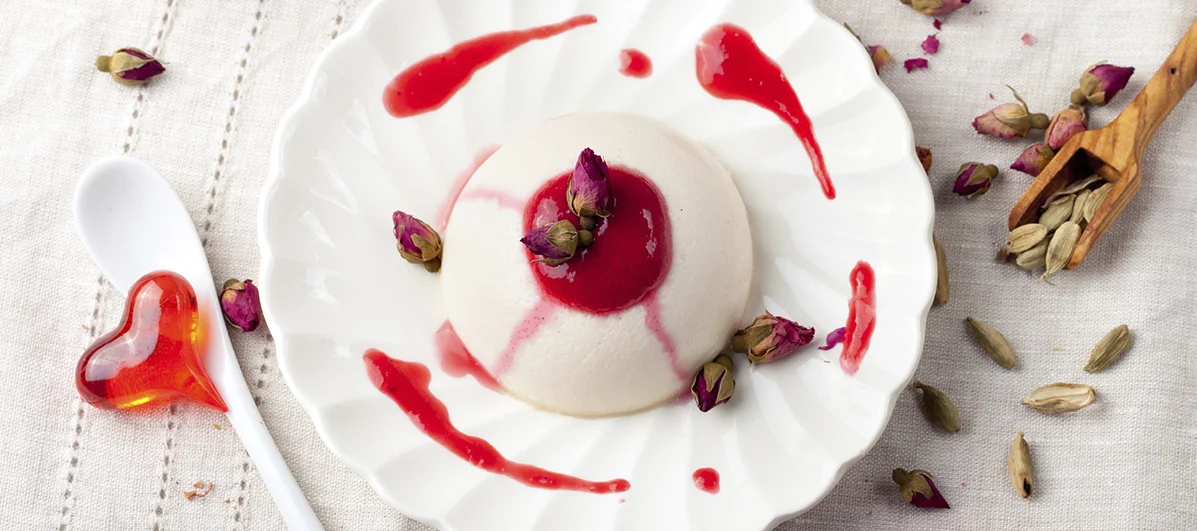 Panna cotta,with berry sauce. Italian dessert. 