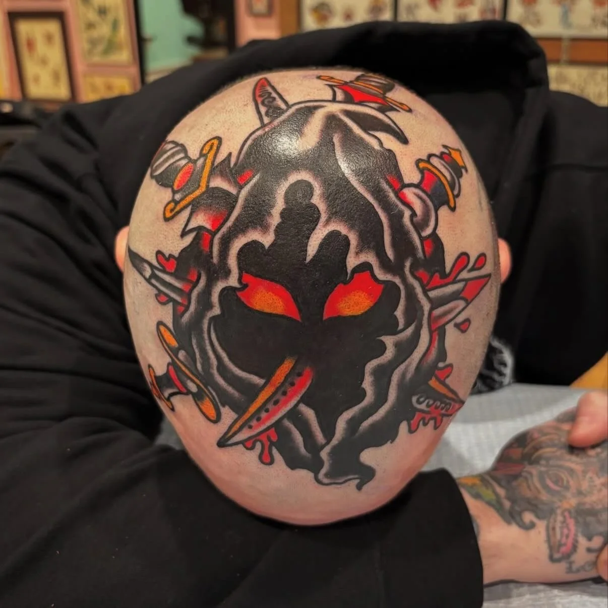 Tired of your boring old head? Let @j.zanghi take a stab at it&hellip; menacing cloaked pin cushion done in one shot by Justin. Call 207 800 TAT2 or stop by today. WALK-INS WELCOME!!!
