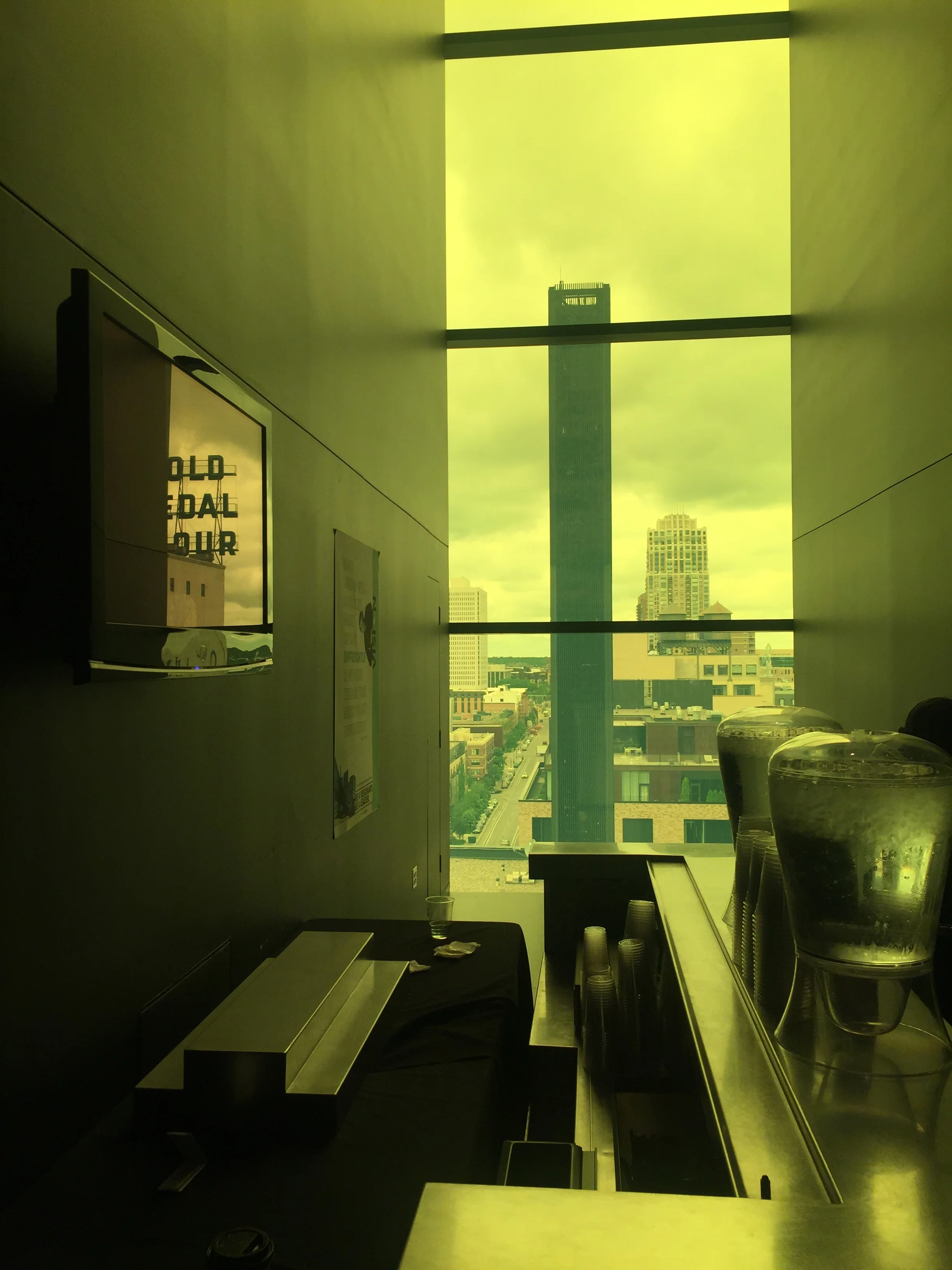 Note the reflection of the iconic "Gold Metal Flower"building