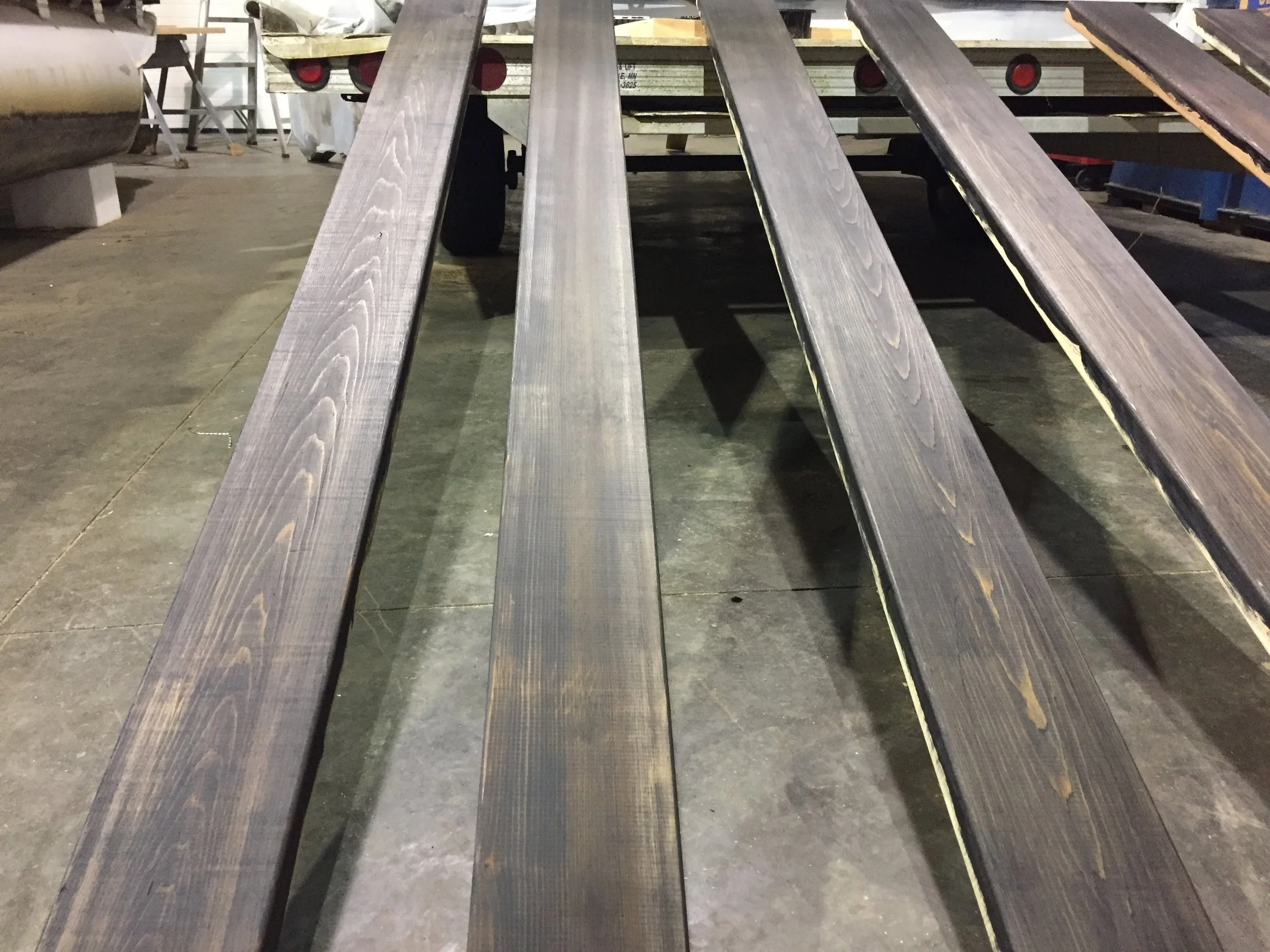 First coat of stain on the floorboards.