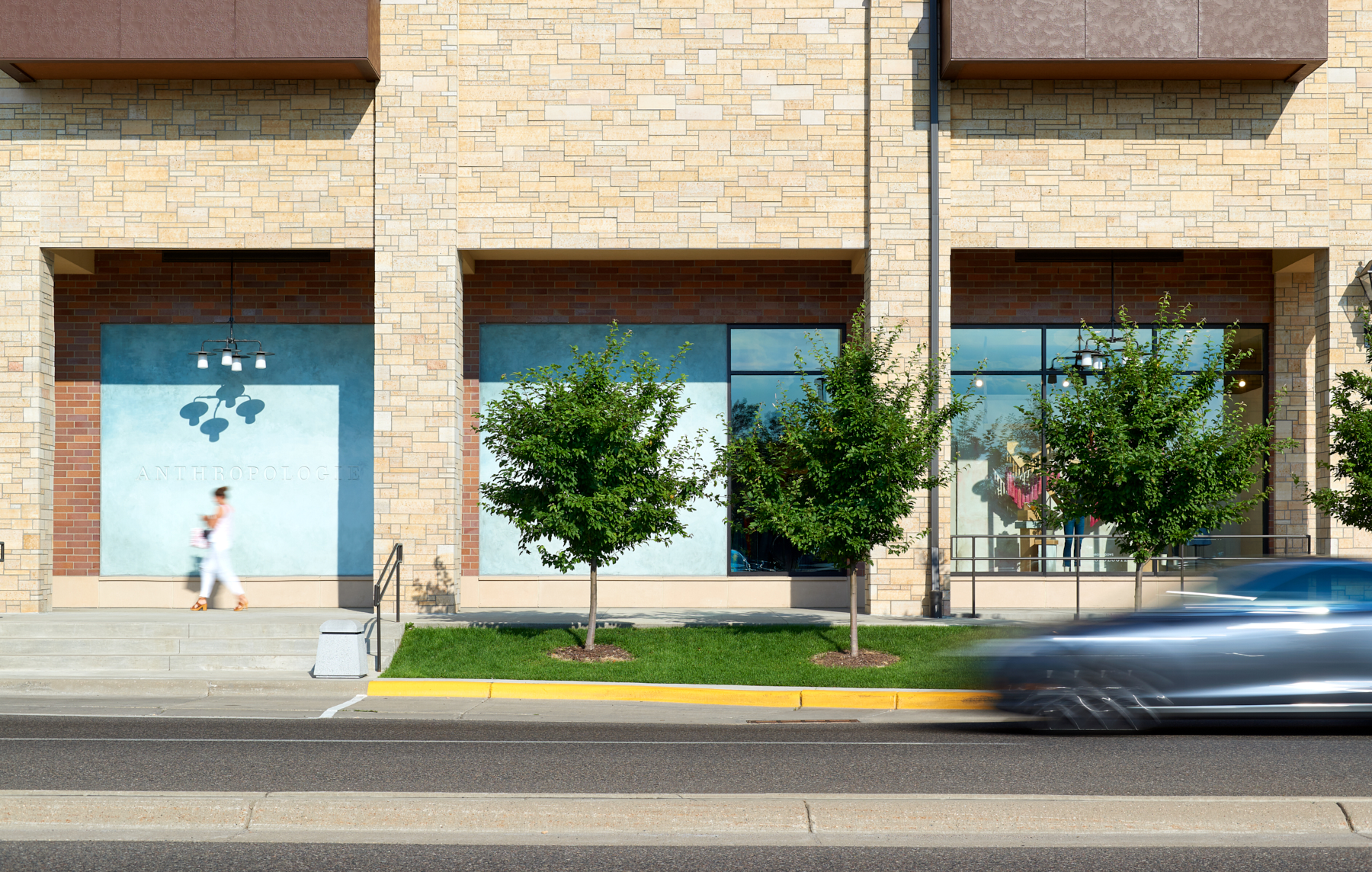 Exterior sidewalk area of Anthropologie in Wayzata, Minnesota, created in collaboration with NewStudio Architecture