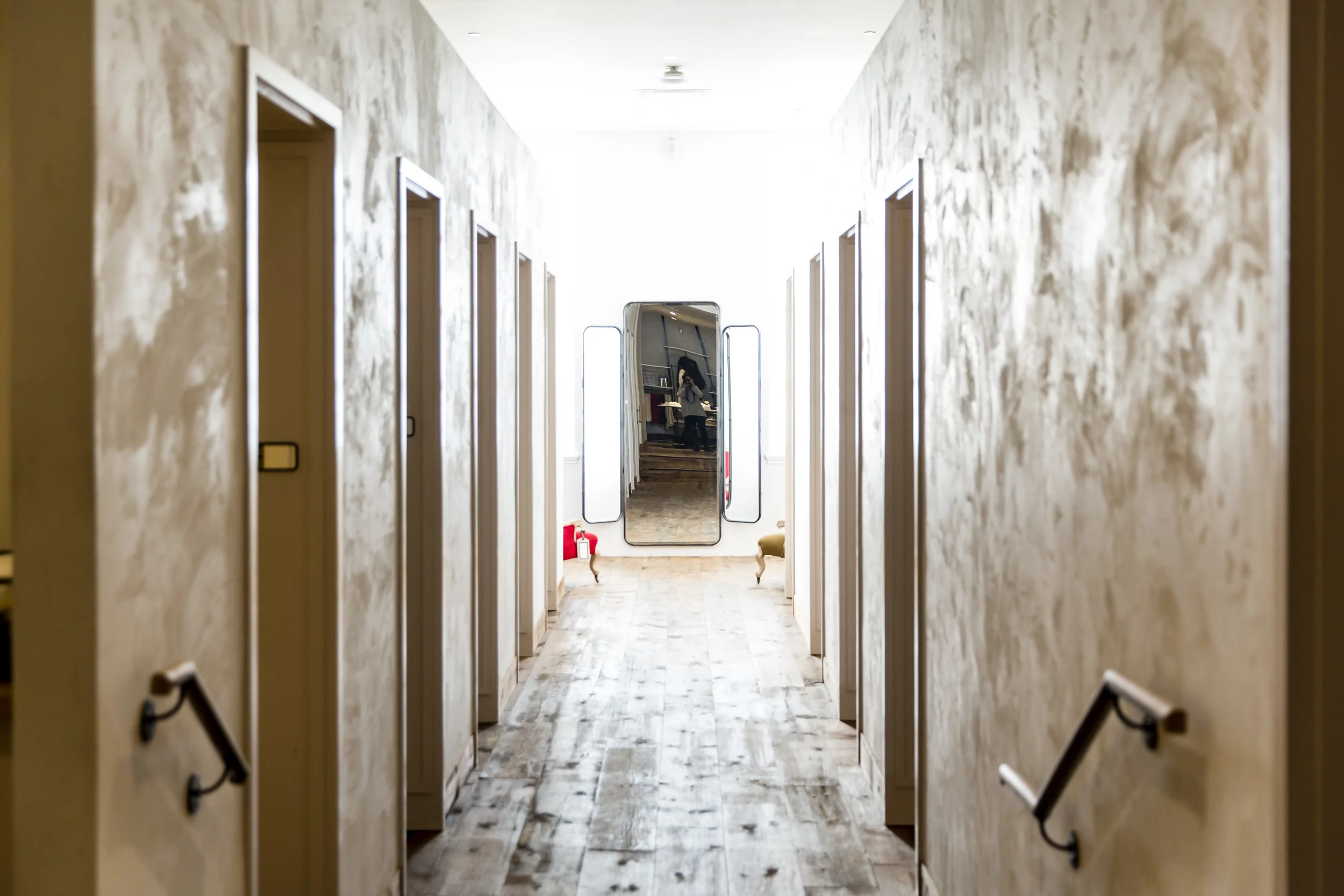 Interior design of fitting room area at Anthropologie in Toronto, created in collaboration with NewStudio Architecture
