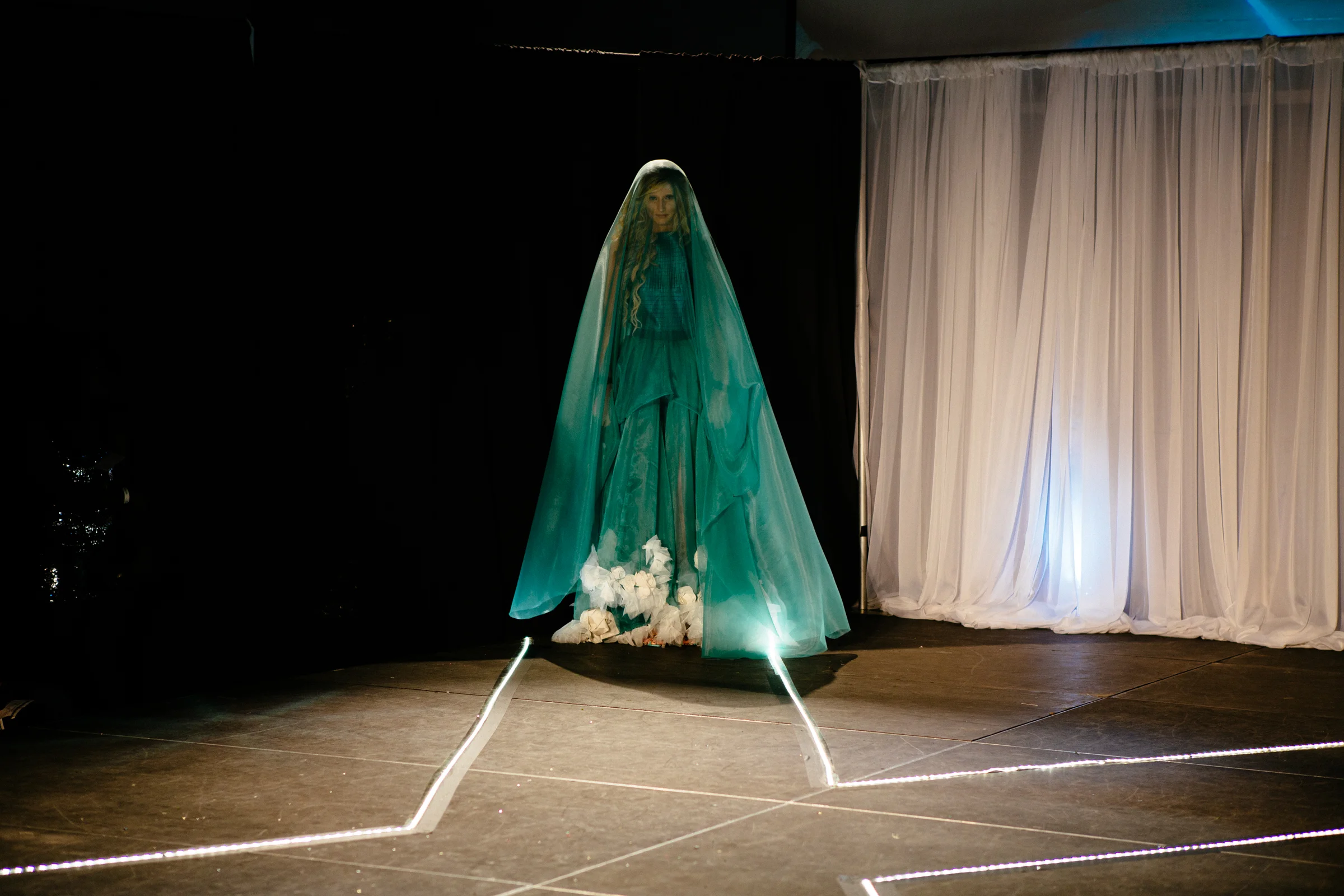 NewStudio Architecture's entry in the IIDA Fusion + Fashion runway show featured materials such as wallcovering and upholstery fabrics.