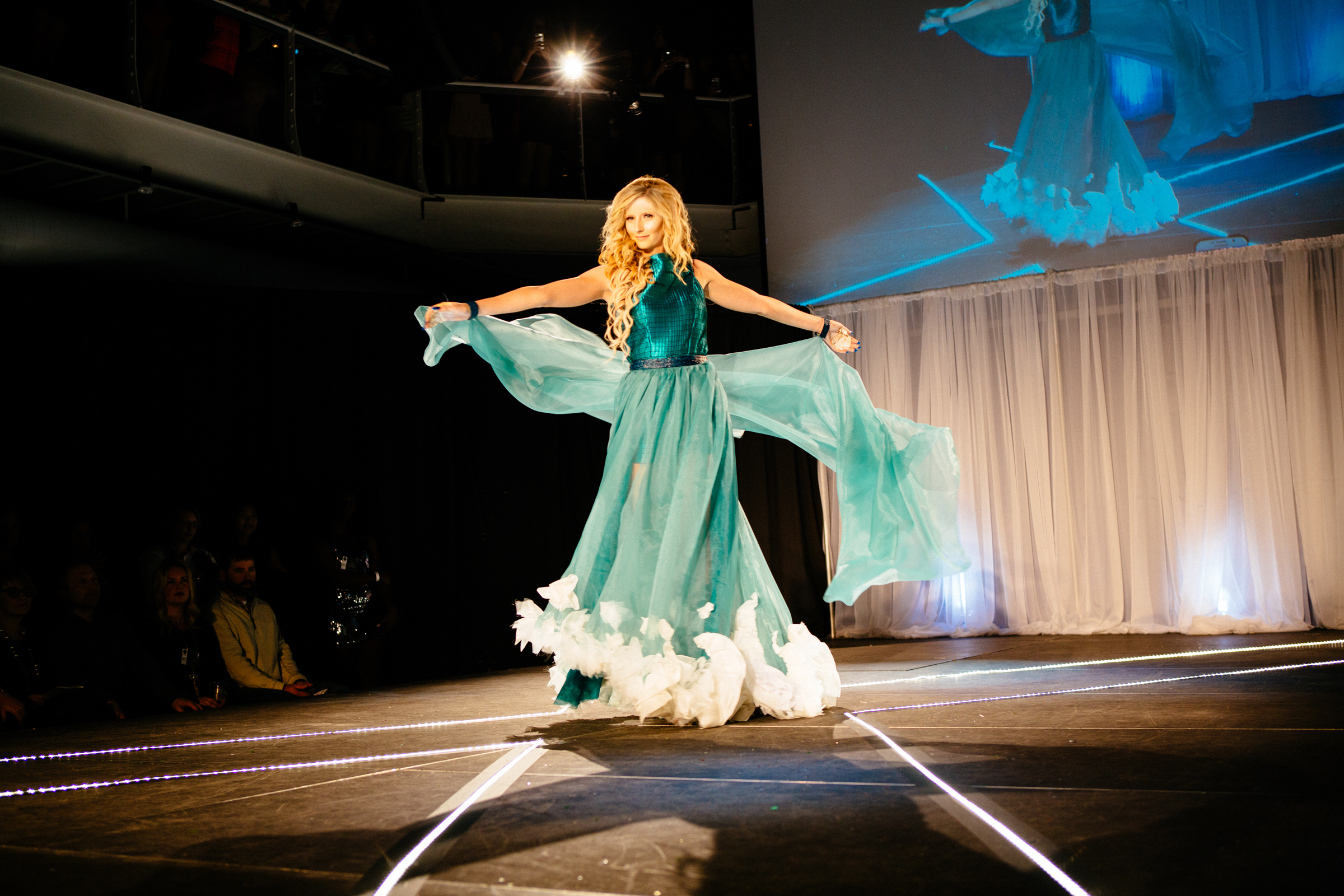 NewStudio Architecture's entry featured a flowing cape and wave-inspired hemline for the IIDA Fusion + Fashion runway show
