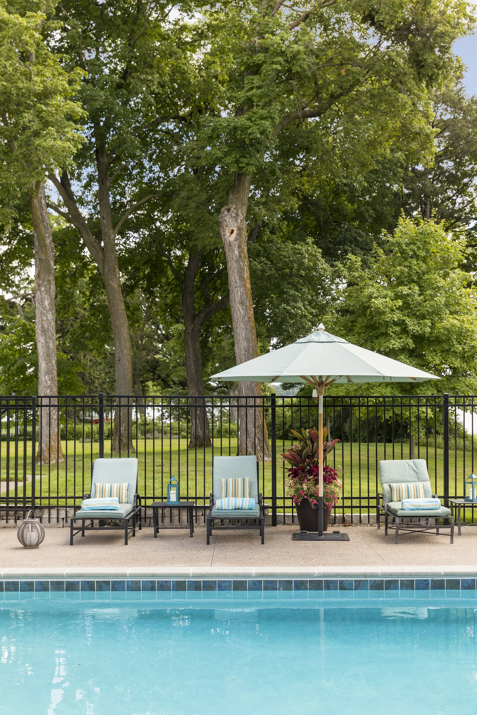 Pool area designed by NewStudio Architecture complements landscape design
