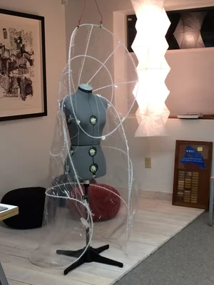 The clear cape designed by NewStudio Architecture for the IIDA Fusion + Fashion fundraiser