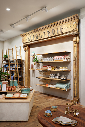 Reclaimed wood interior design details at Anthropologie in Mall of America, created in collaboration with NewStudio Architecture