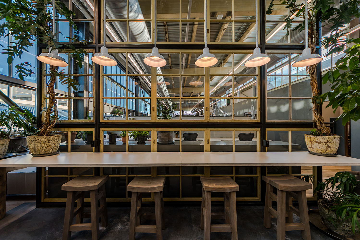 NewStudio Architecture collaborated with URBN to design Navy Yard Building 18 Annex with light-filled workspaces for Terrain staff