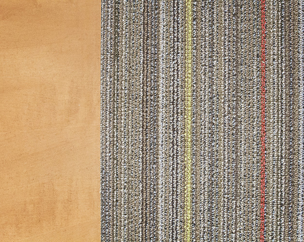 Wood accents and striped carpeting add texture to the office space's interior design created by NewStudio Architecture