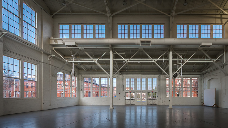 Philadelphia Navy Yard, Building 3, features multi-panel windows on two levels for this well-lit interior; designed in collaboration with NewStudio Architecture 