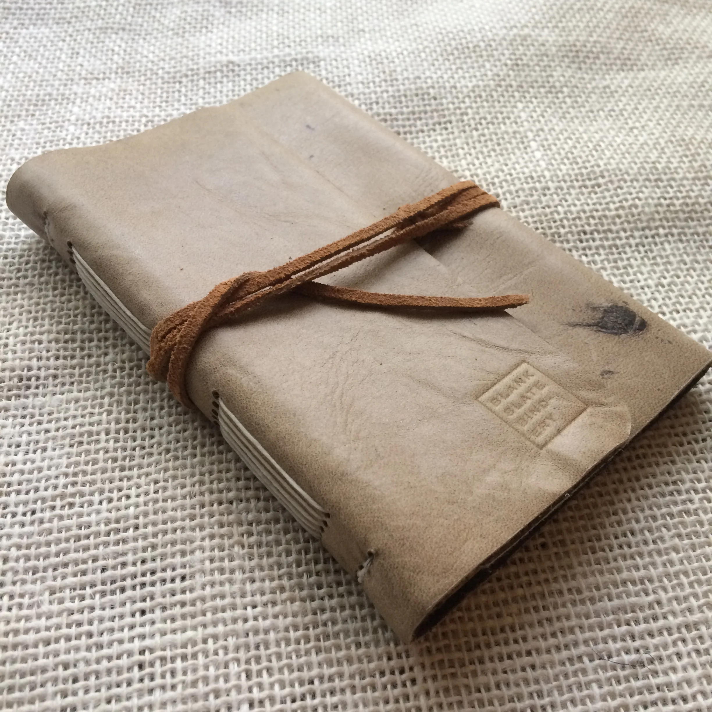 This glossy tan cowhide feels soft but durable.