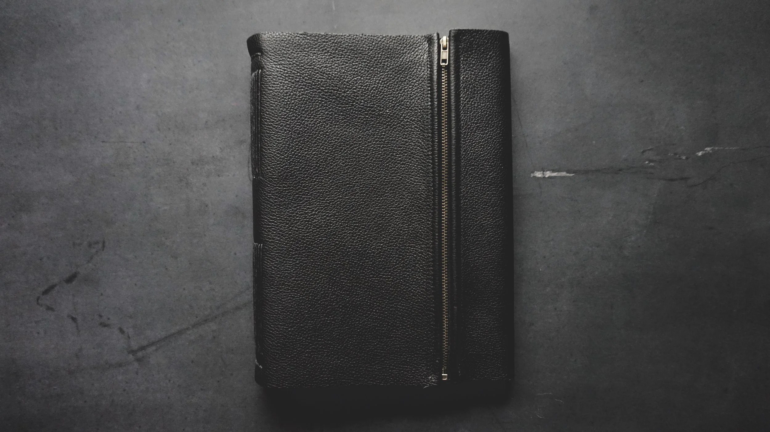 8.5” x 11” leather zip sketchbook