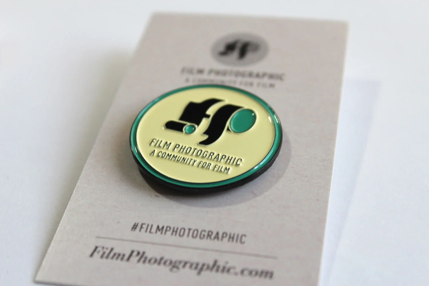 fp-round-logo-pin-detail.png