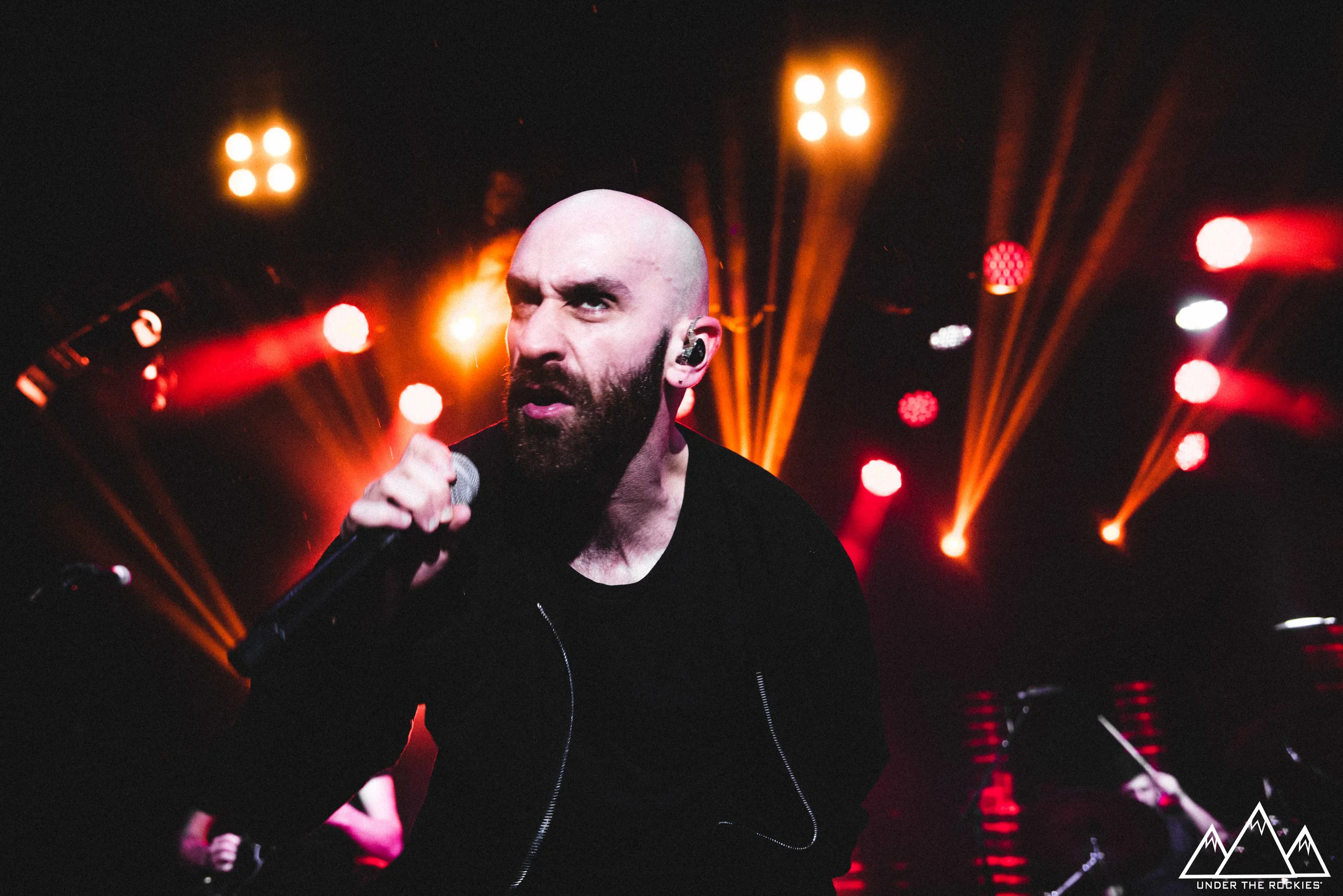 Sam Harris of X Ambassadors performing at the Coca-Cola Stage.