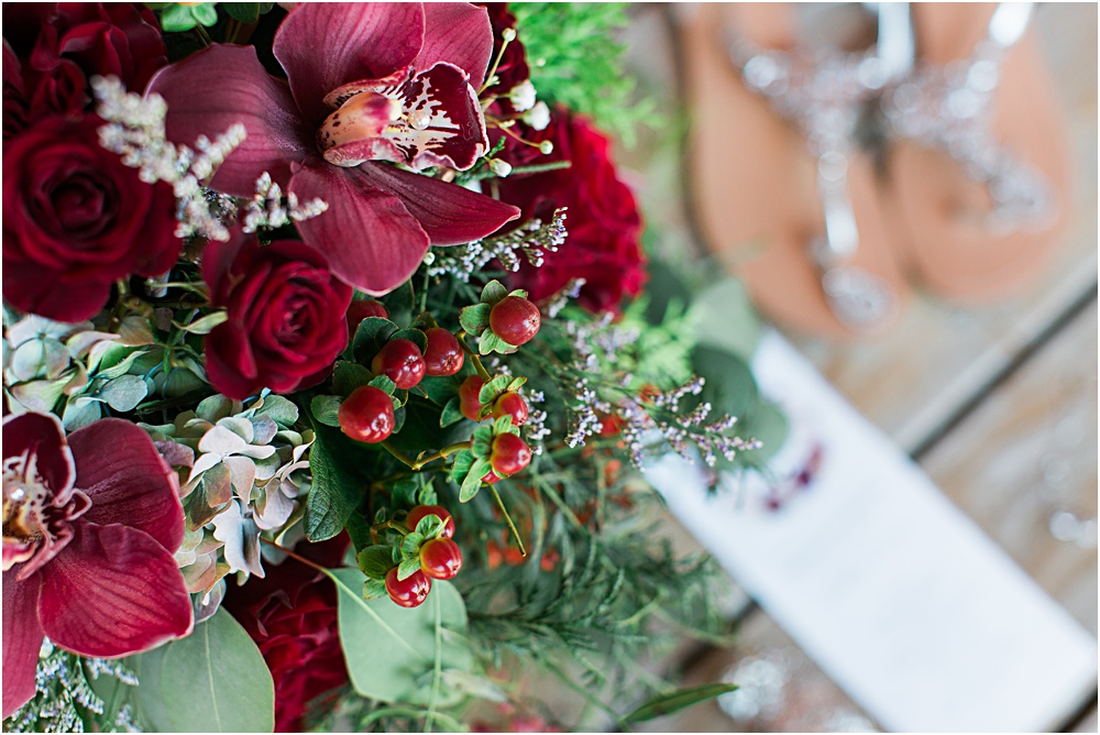Minnesota summer wedding photo showing burgundy wine red floral bride bouquet