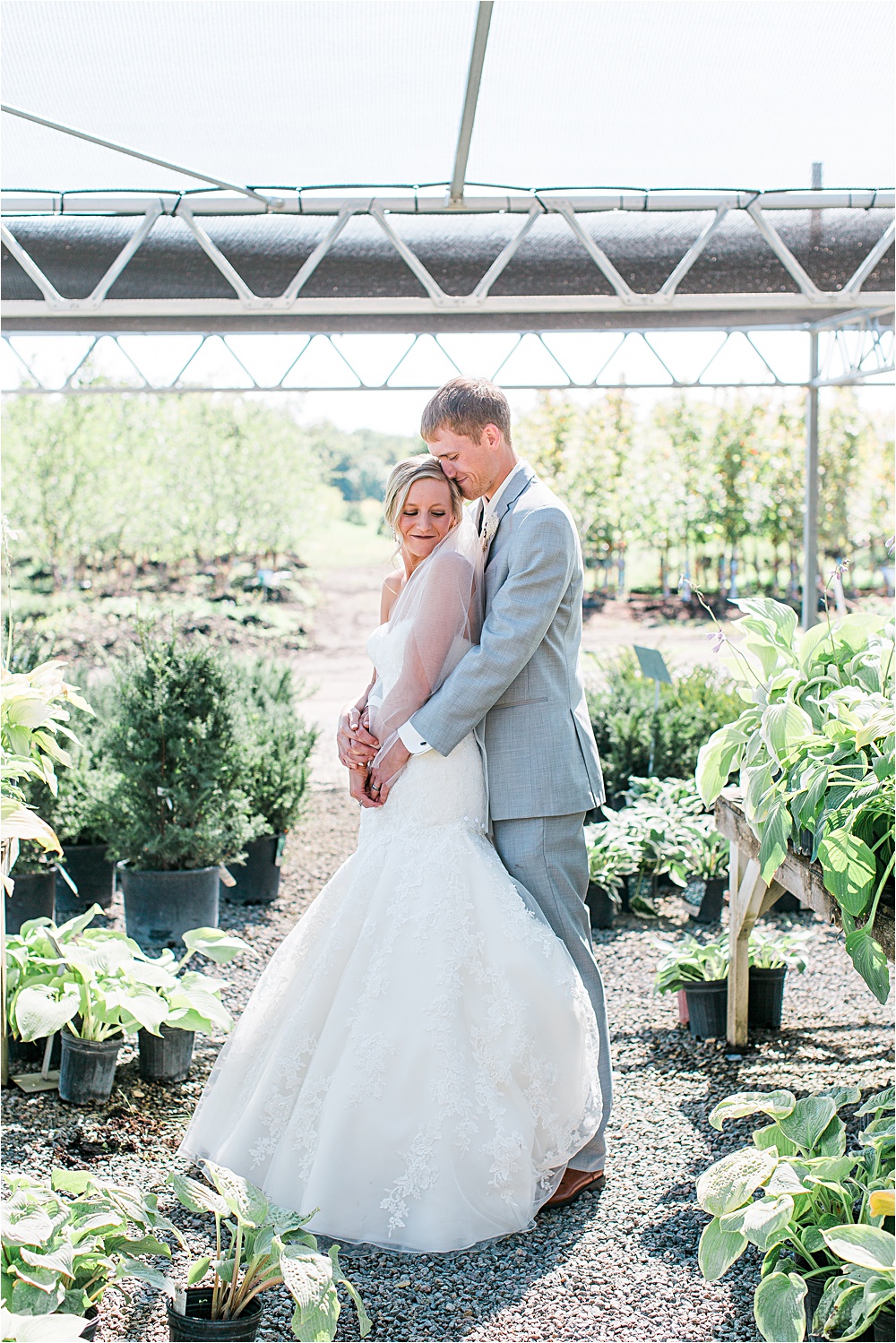 Bride and groom portrait outside at Minnesota summer wedding in Buffalo MN photographed by Mallory Kiesow, Minnesota wedding photographer