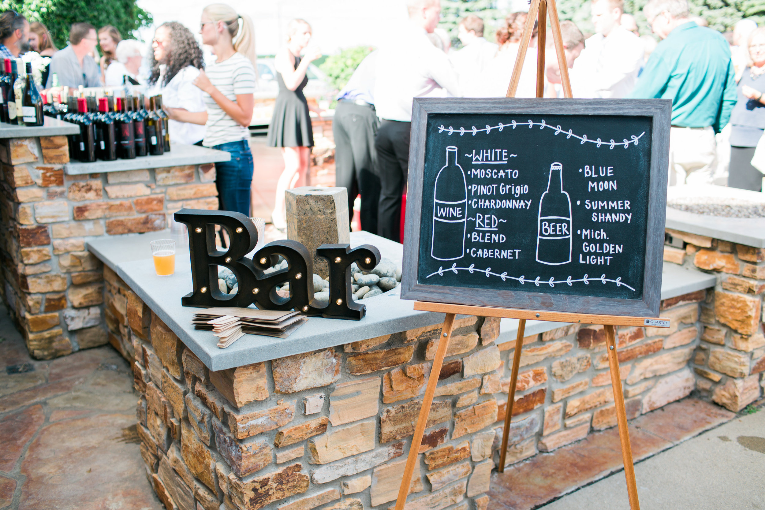 The Outpost Center in Chaska Minnesota rustic outdoor bar setup Minnesota wedding photography Mallory Kiesow Photography