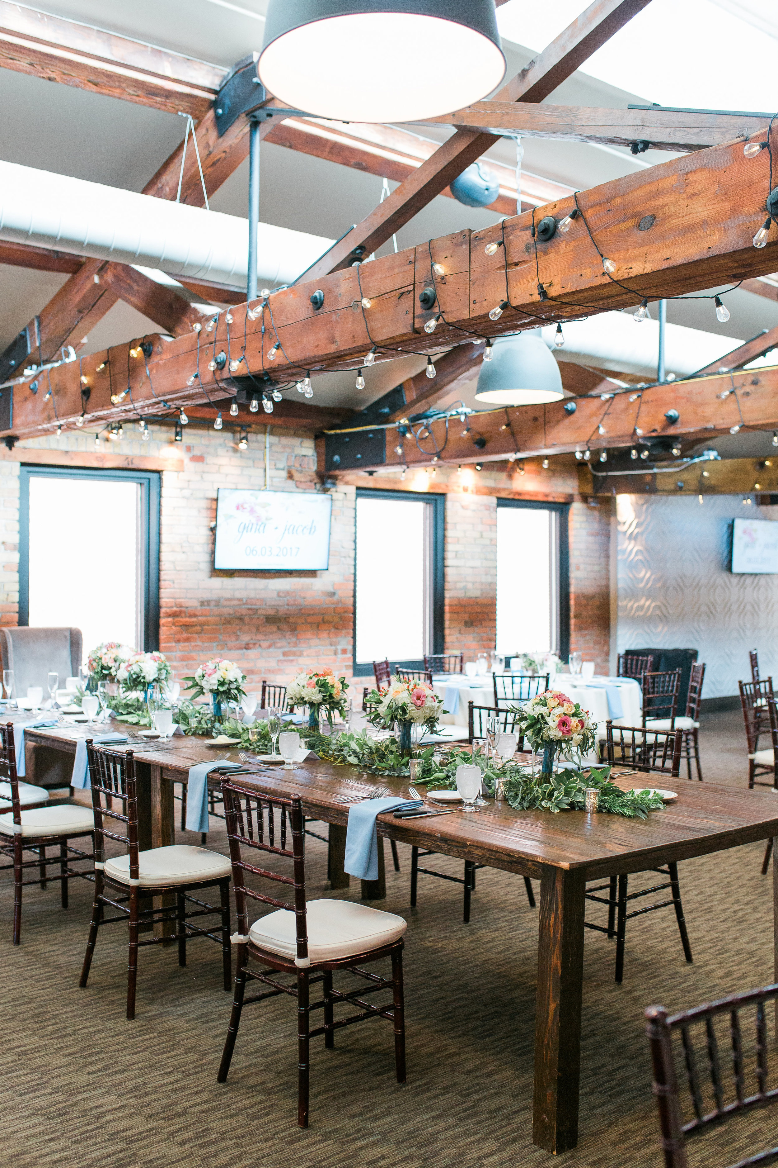 Minneapolis Event Centers wedding reception space setup wood cafe lights Minnesota wedding photography Mallory Kiesow Photography