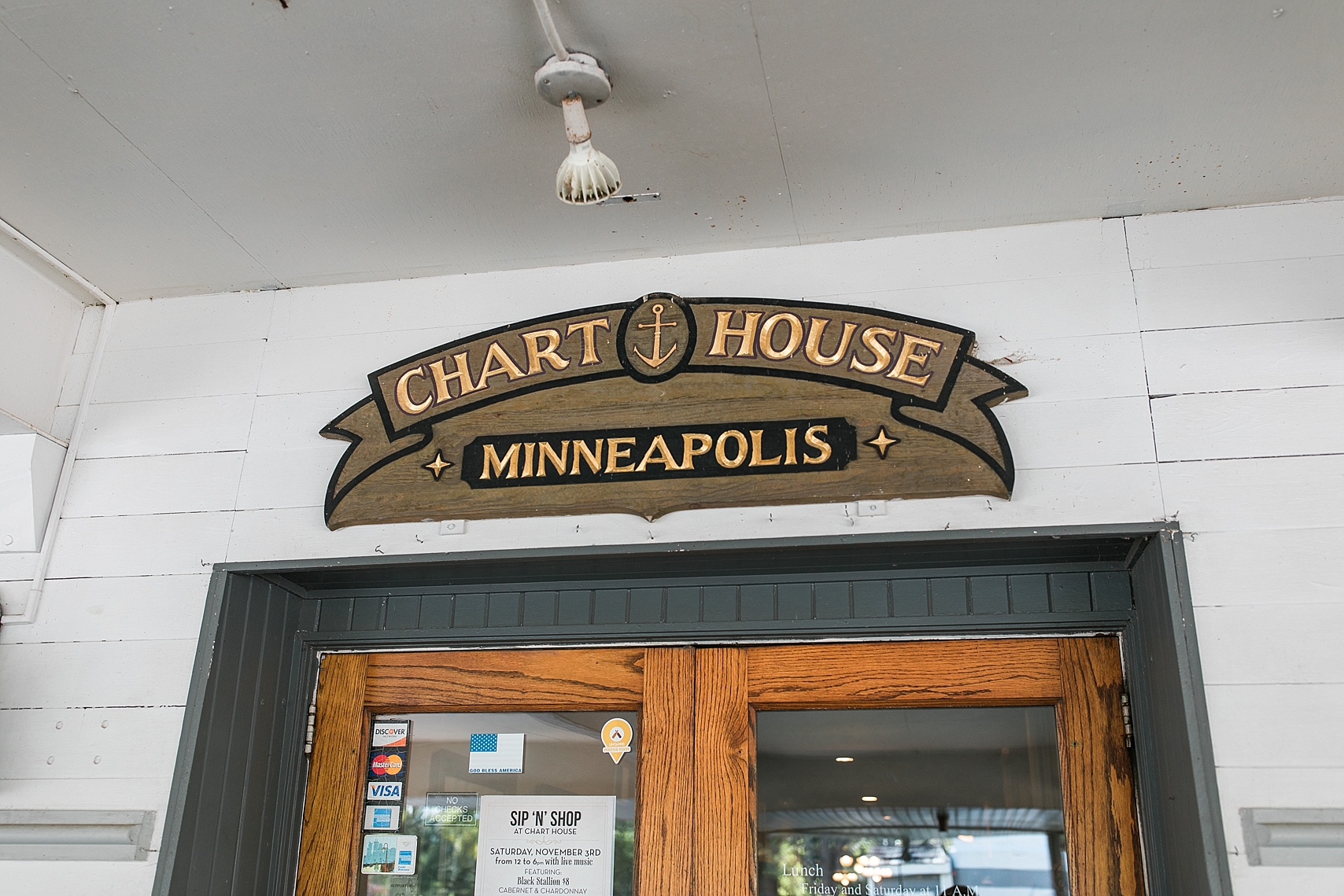 The Chart House restaurant sign wedding at the Chart House Summer Wedding Lakeville Minnesota Minneapolis Wedding Photographer Mallory Kiesow