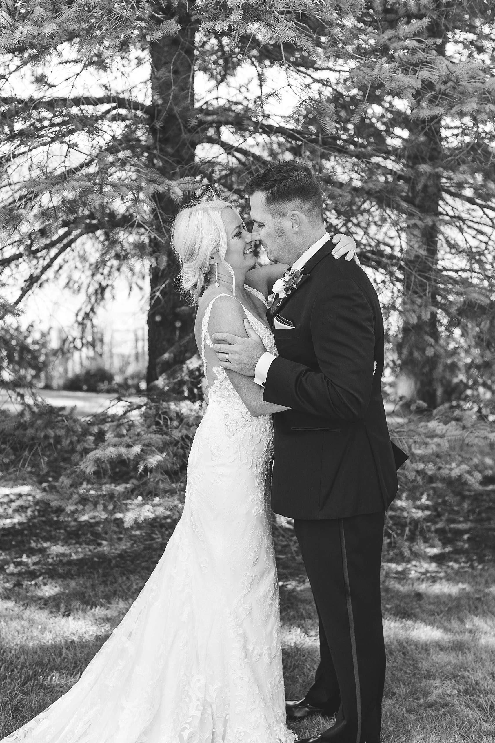 Bride and groom black and white wedding portraits on wedding day at the Chart House Summer Wedding Lakeville Minnesota Minneapolis Wedding Photographer Mallory Kiesow
