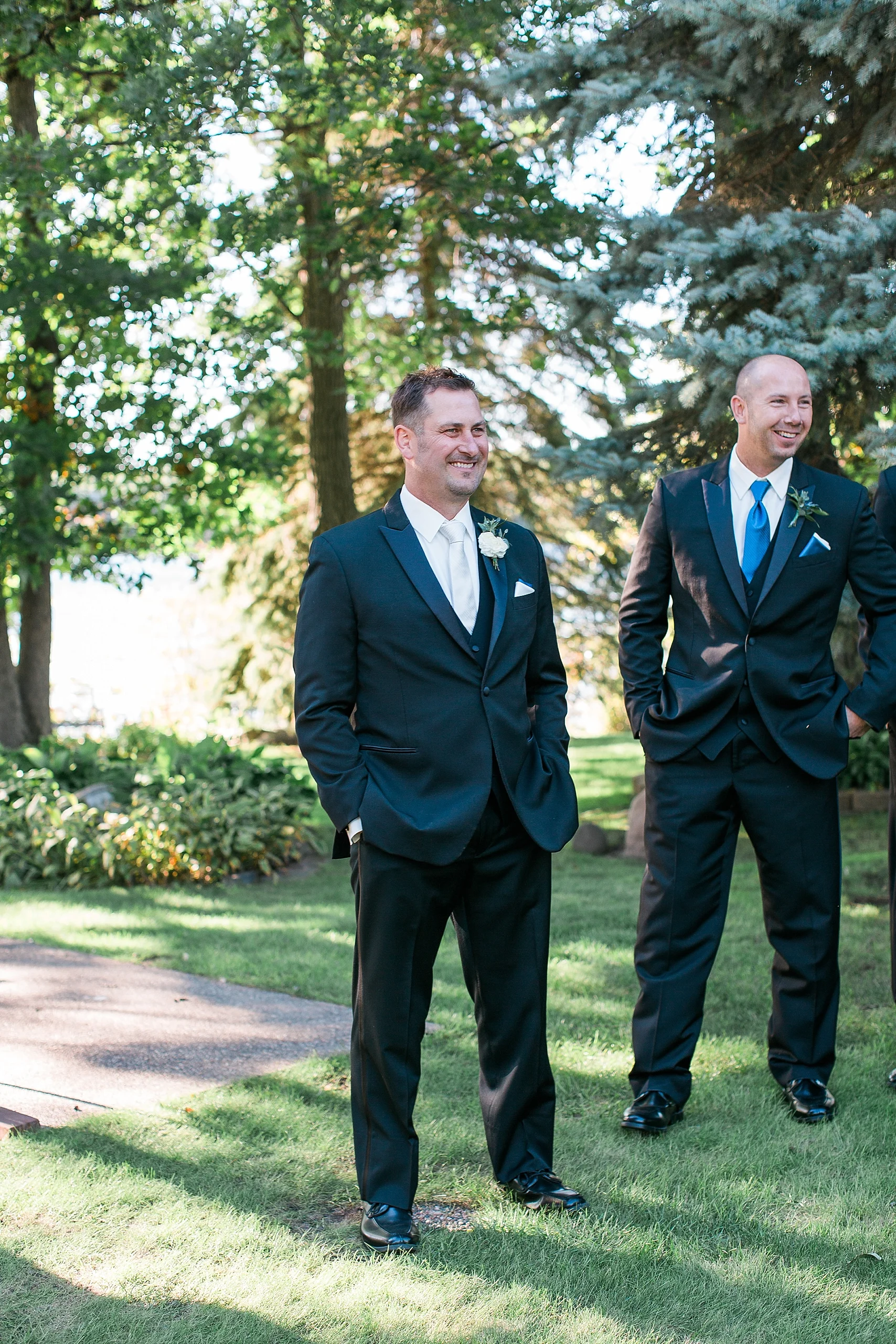 Outdoor wedding ceremony groom waiting for bride at the Chart House Summer Wedding Lakeville Minnesota Minneapolis Wedding Photographer Mallory Kiesow