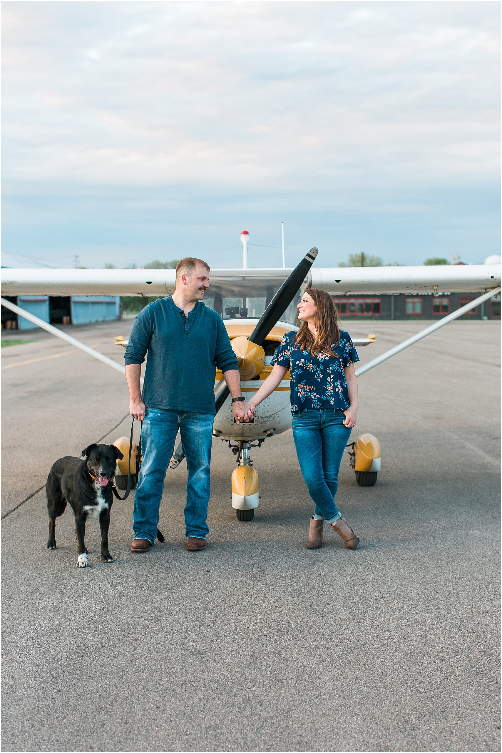 Minneapolis airplane engagement photography session at flying cloud airport in Eden Prairie photographed by Mallory Kiesow Minneapolis engagement and wedding photographer_8.jpg