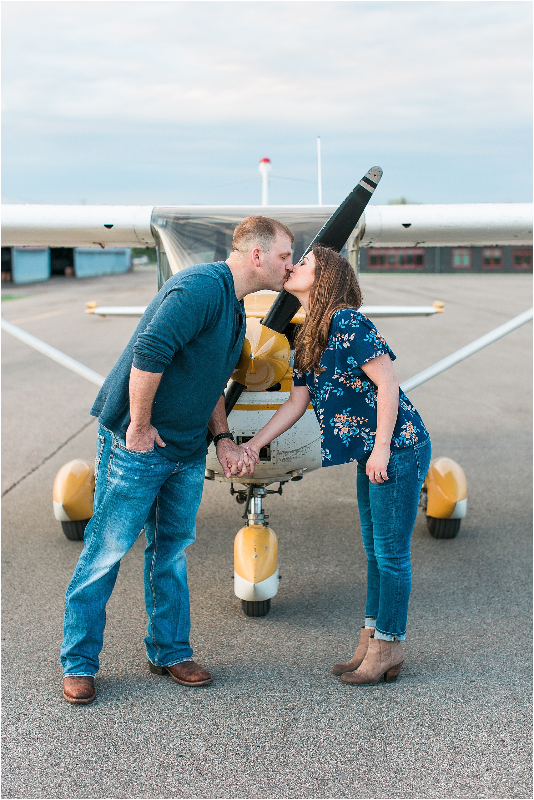 Minneapolis airplane engagement photography session at flying cloud airport in Eden Prairie photographed by Mallory Kiesow Minneapolis engagement and wedding photographer_9.jpg