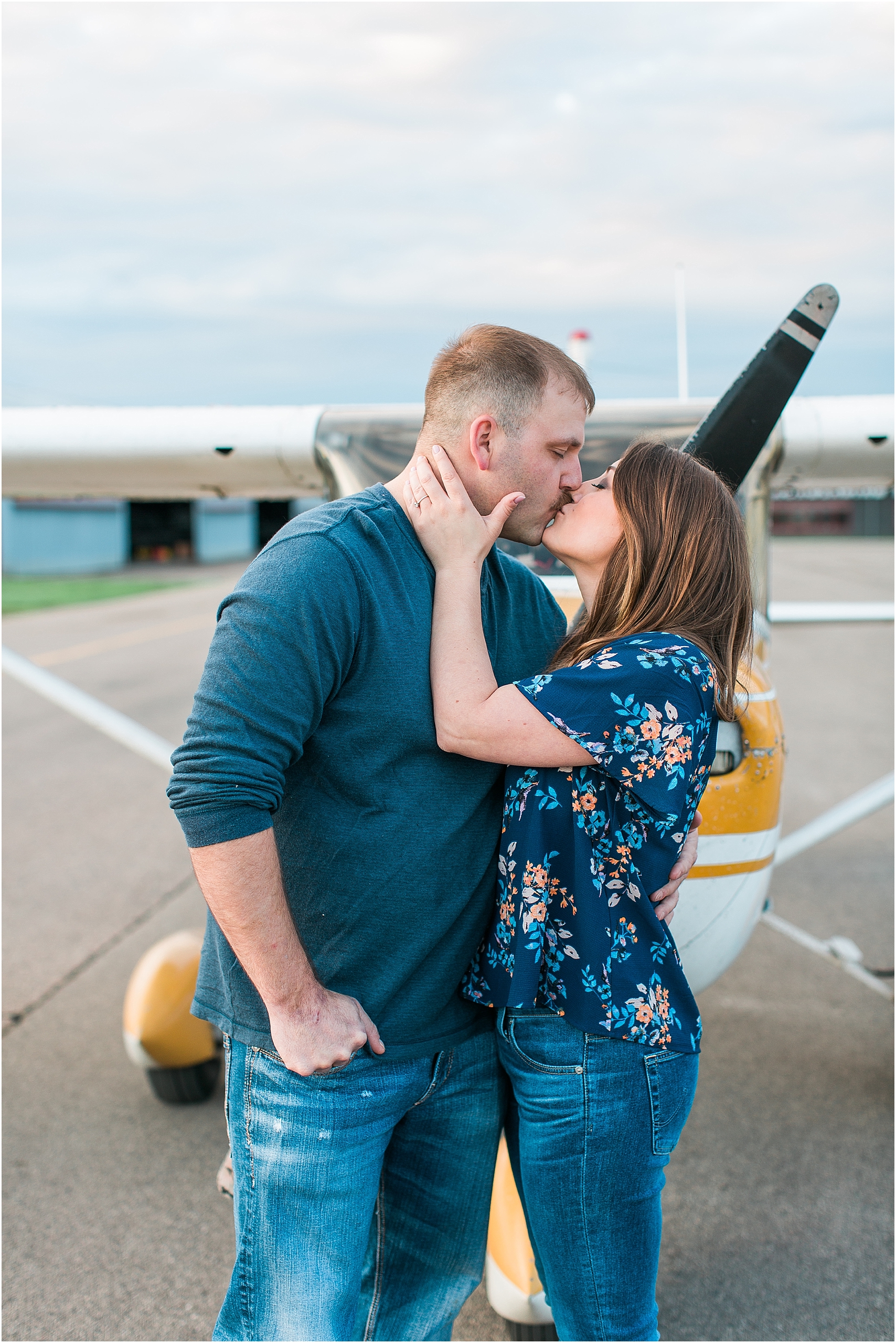 Minneapolis airplane engagement photography session at flying cloud airport in Eden Prairie photographed by Mallory Kiesow Minneapolis engagement and wedding photographer_11.jpg