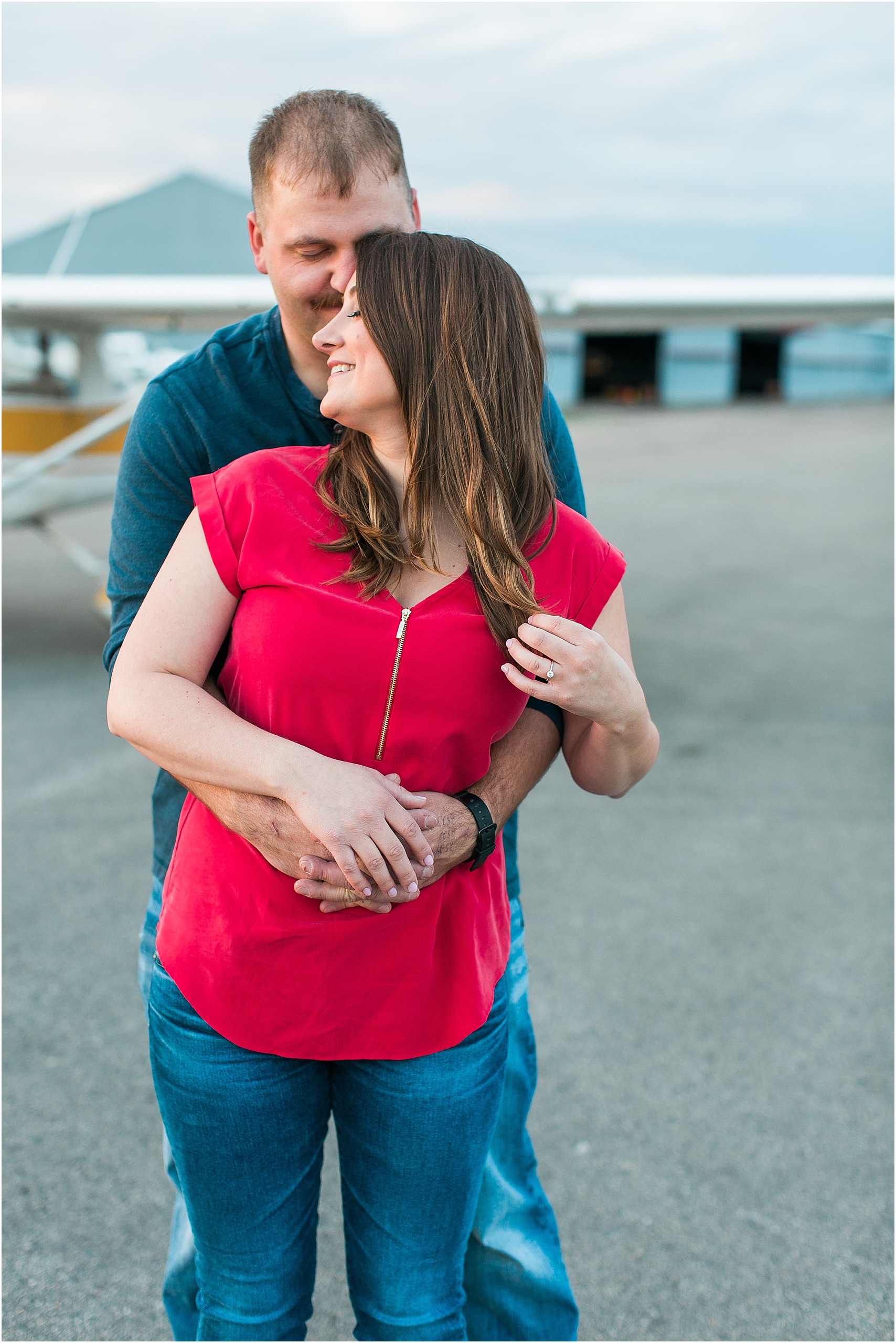 Minneapolis airplane engagement photography session at flying cloud airport in Eden Prairie photographed by Mallory Kiesow Minneapolis engagement and wedding photographer_14.jpg