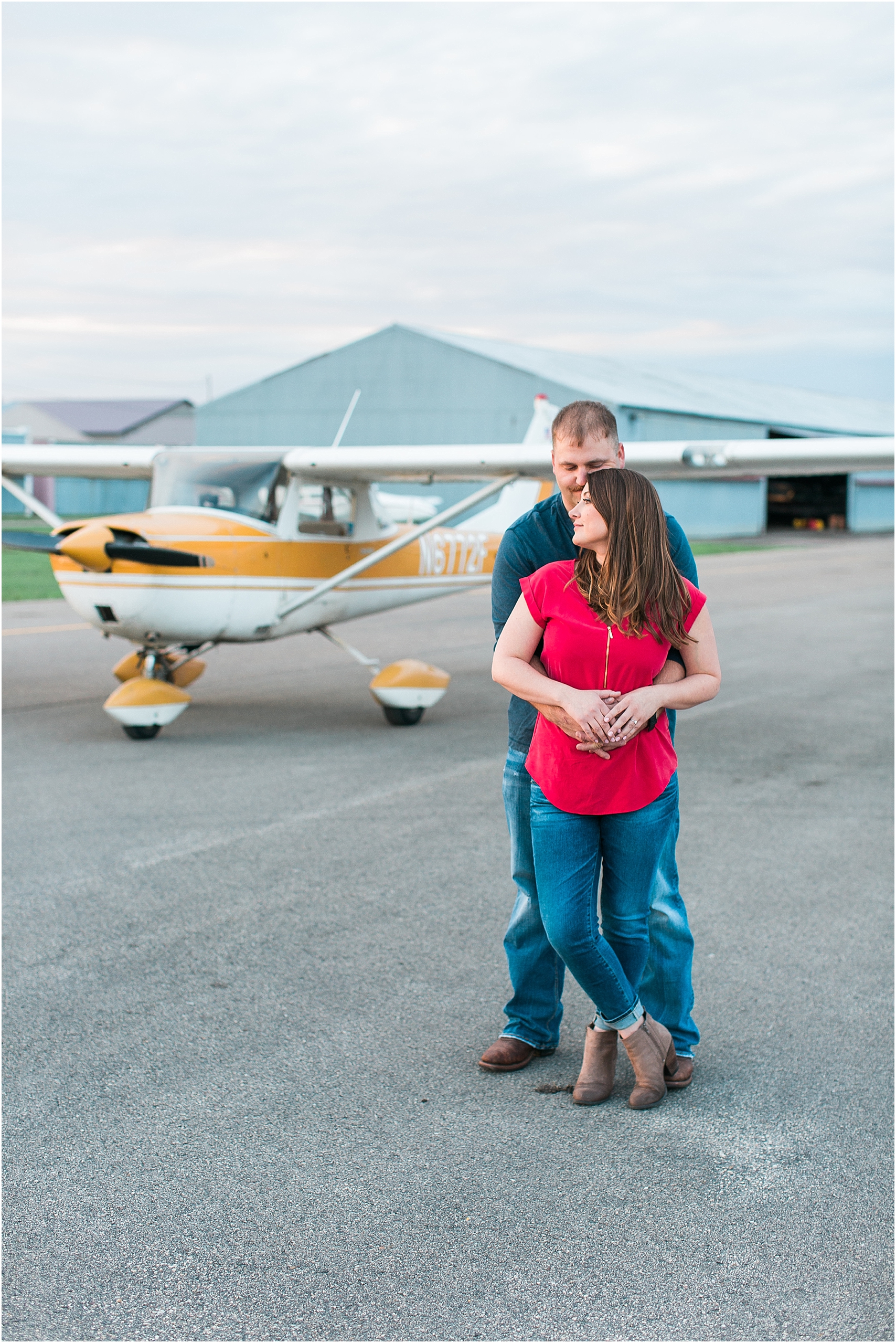 Minneapolis airplane engagement photography session at flying cloud airport in Eden Prairie photographed by Mallory Kiesow Minneapolis engagement and wedding photographer_15.jpg