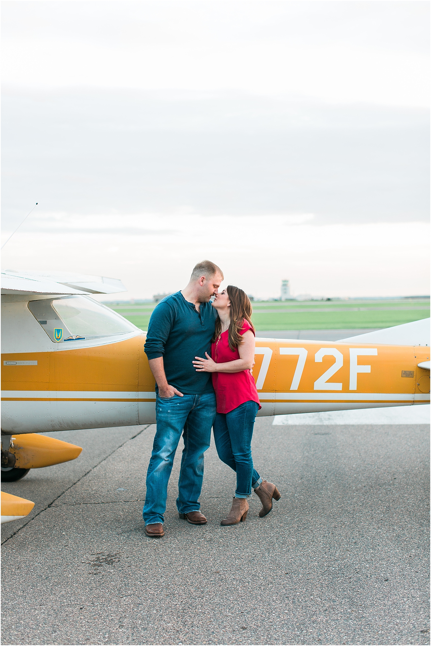 Minneapolis airplane engagement photography session at flying cloud airport in Eden Prairie photographed by Mallory Kiesow Minneapolis engagement and wedding photographer_16.jpg