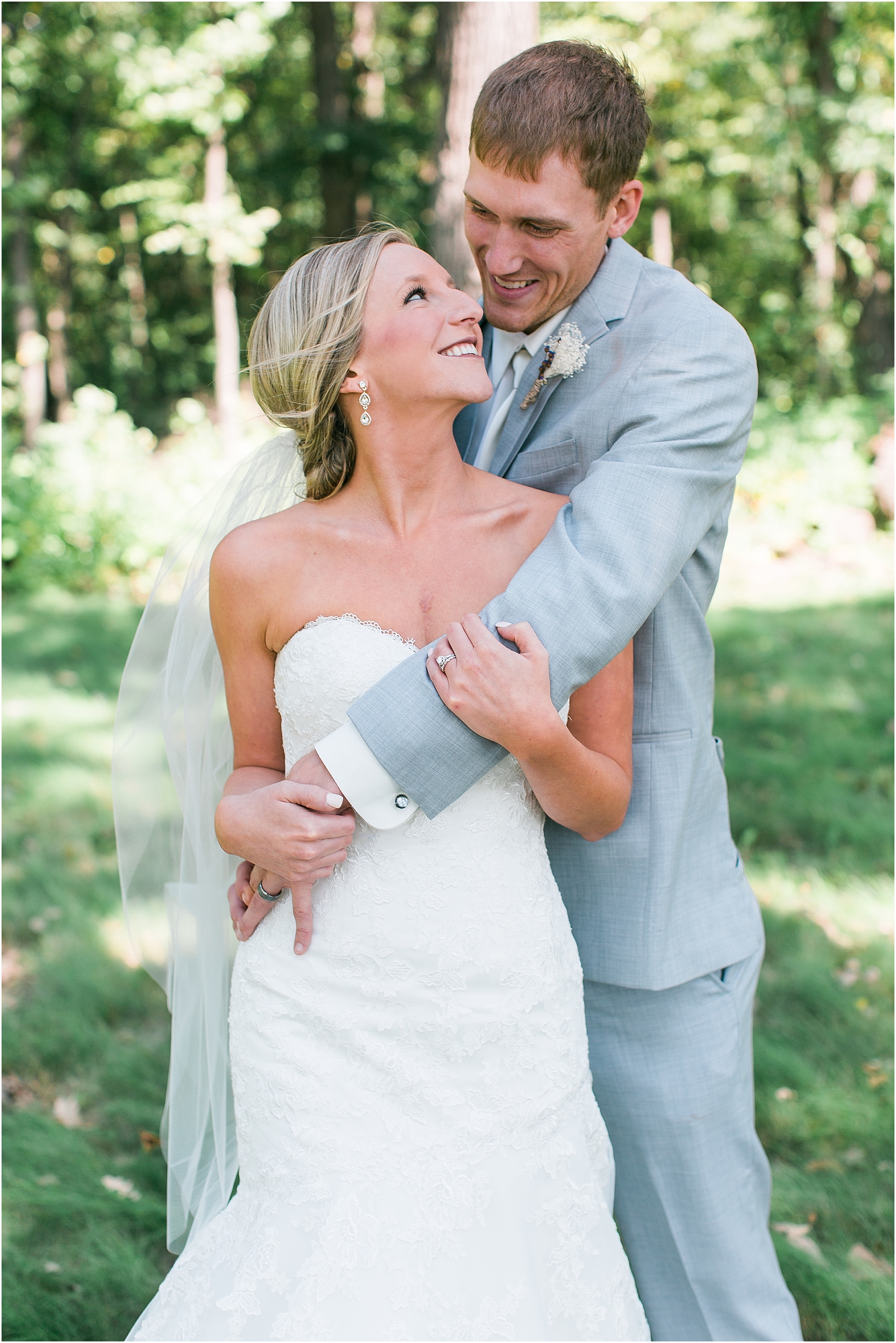 Bride and groom portrait outside at Minnesota summer wedding in Buffalo MN photographed by Mallory Kiesow, Minnesota wedding photographer