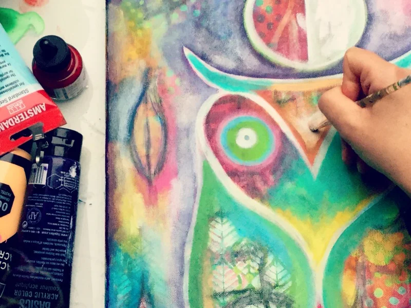 ... then filling the different sections of the design with color, making sure to keep parts of the background visible...