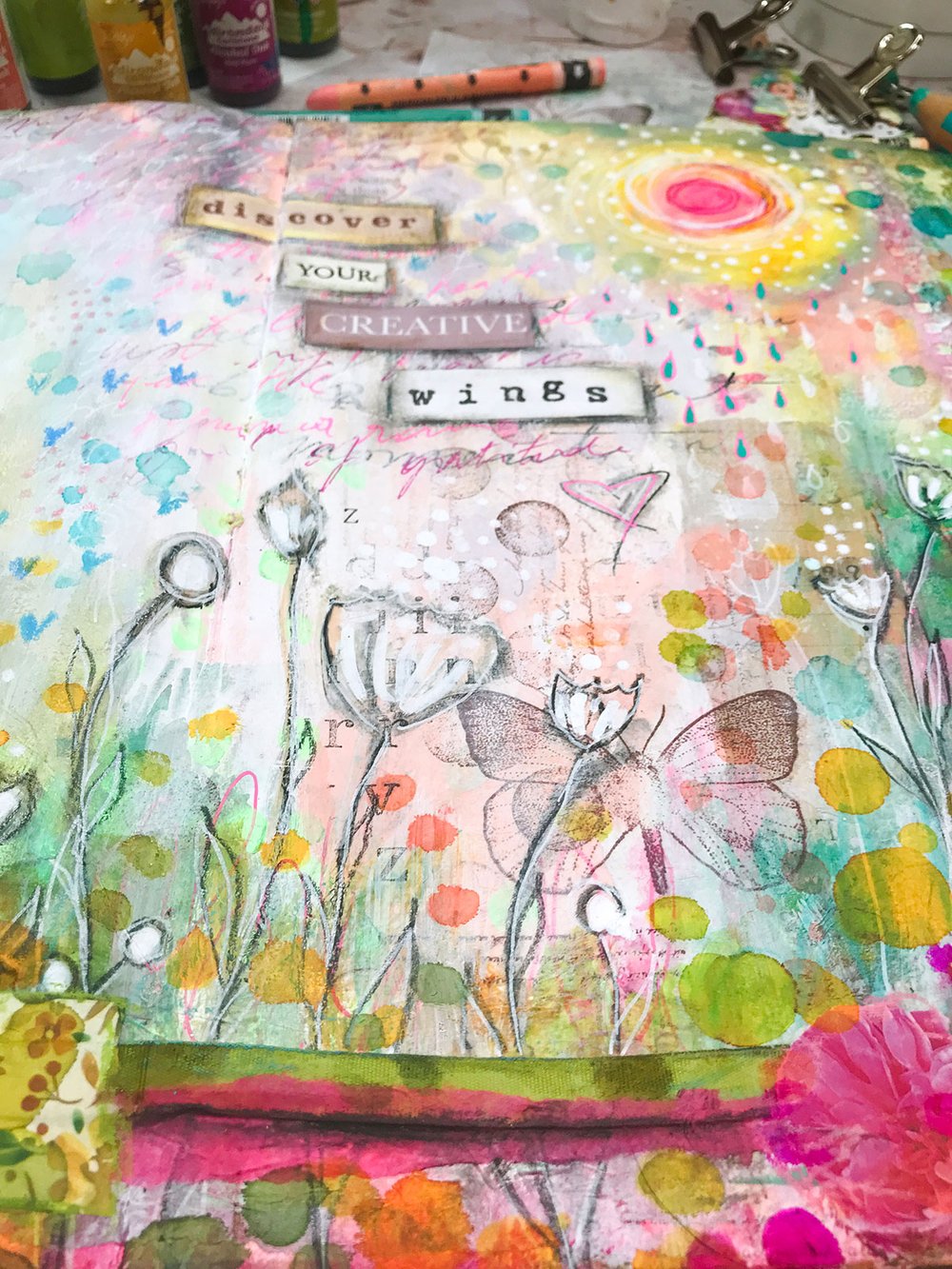 colorful mixed media art journal page with flowers
