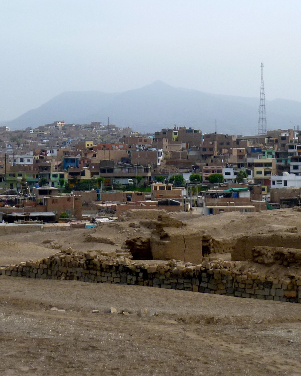 The Community The community around Pachacamac is made up of a variety of settlements, none more than 20 years old. The settlements originate from recent invasion and contain a population of mainly children, teenagers and young adults. The recent nature of the settlements mean that public infrastructure is lacking and there are daily struggles for the possession of land and facilities to make a decent living. These struggles have created divisions between the various settlements and inhibited common development and identity.