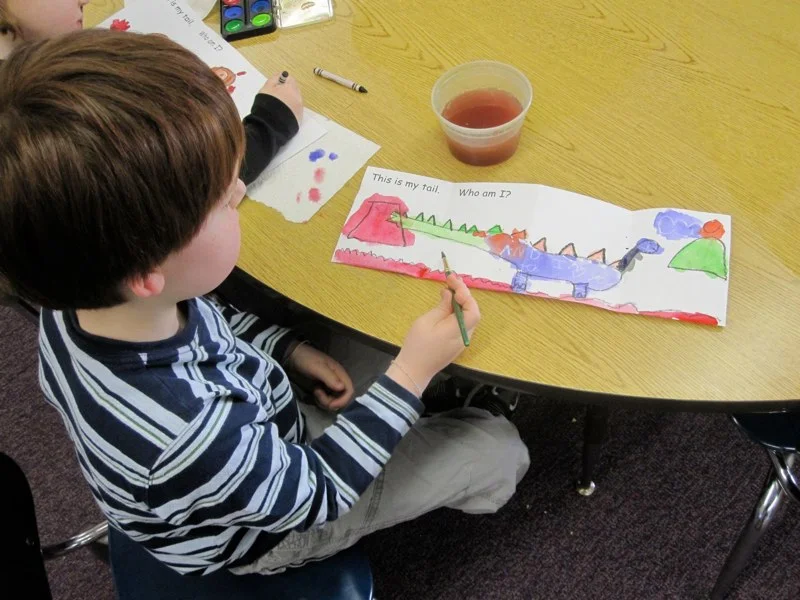 Student Painting at Desk