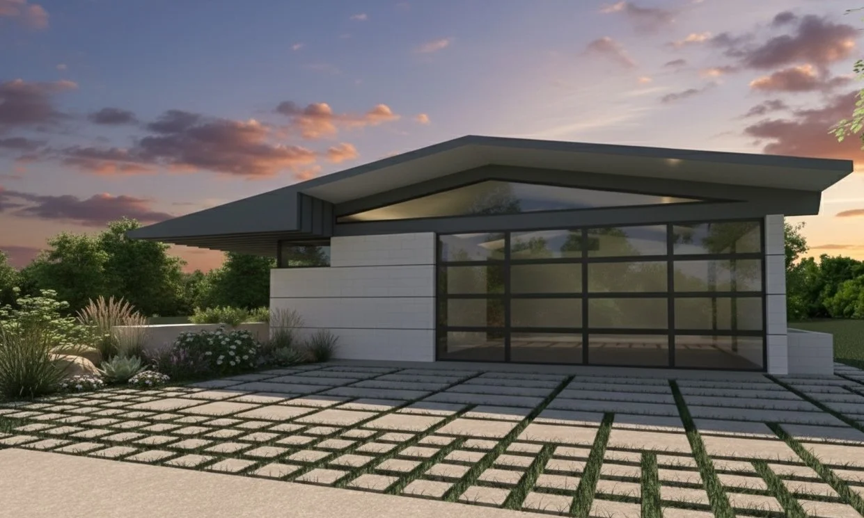 Front exterior view of the California Ranch home from the driveway, showcasing the integrated garage and glass clerestory below the sloped roof.