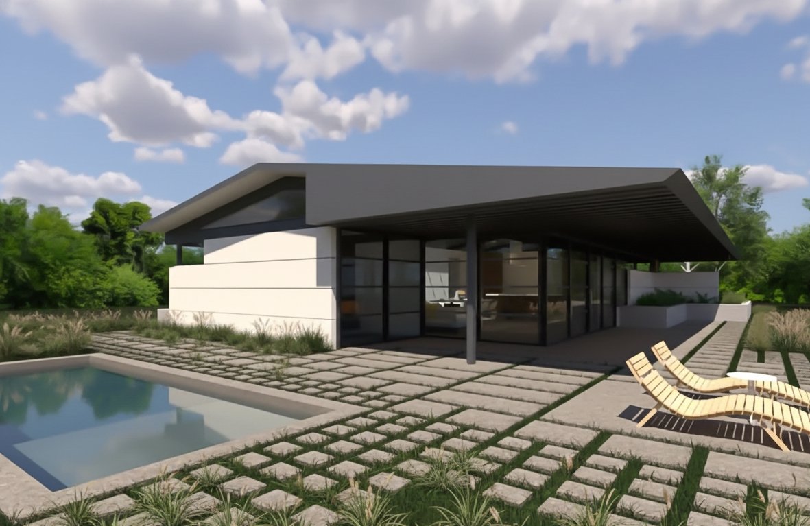 Backyard view of the California Ranch home showing the pool deck, a large roof overhang, and the standing seam metal roof extending indoors