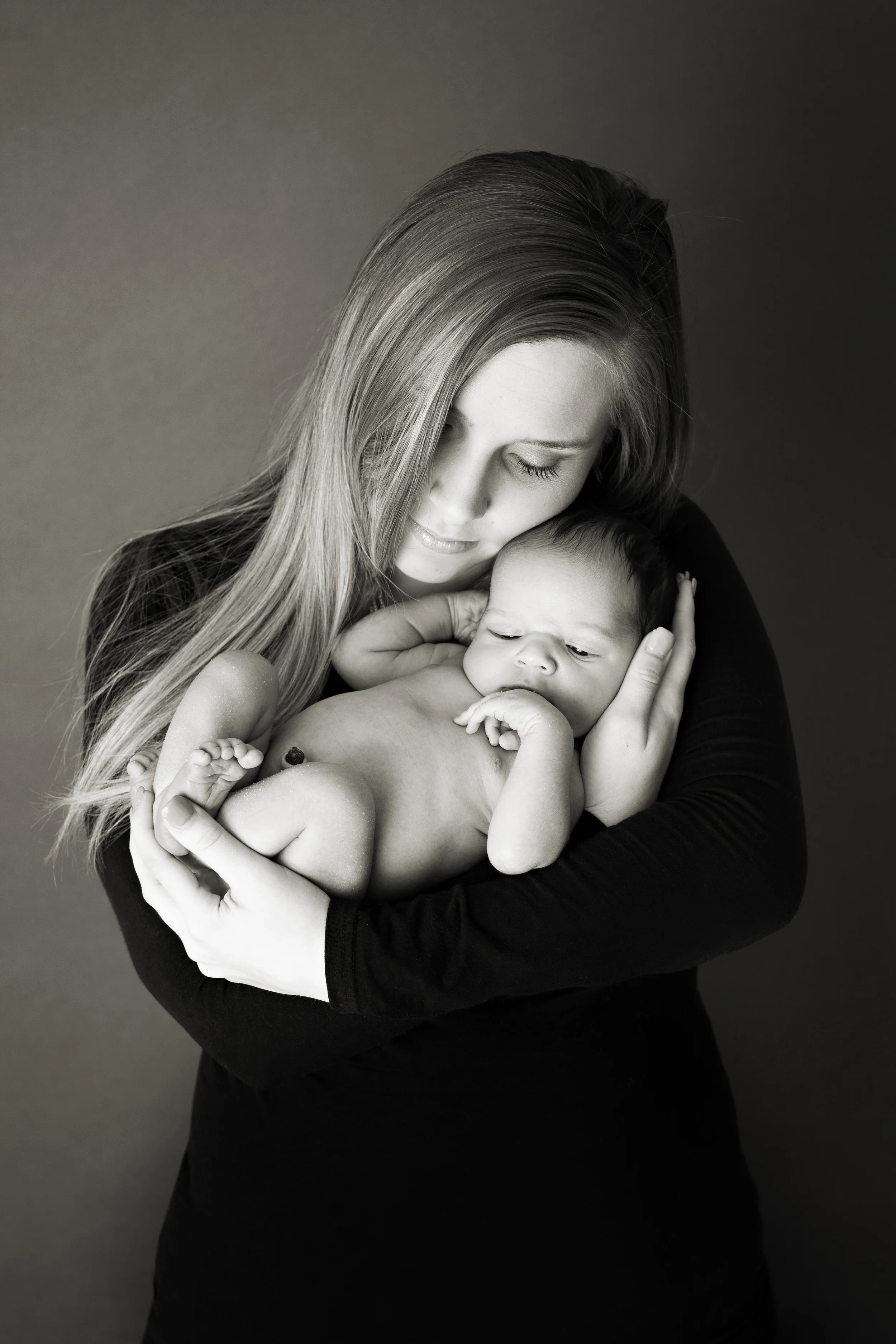 Columbus Newborn photographer, specializing in baby photography. Mom and son portrait. 